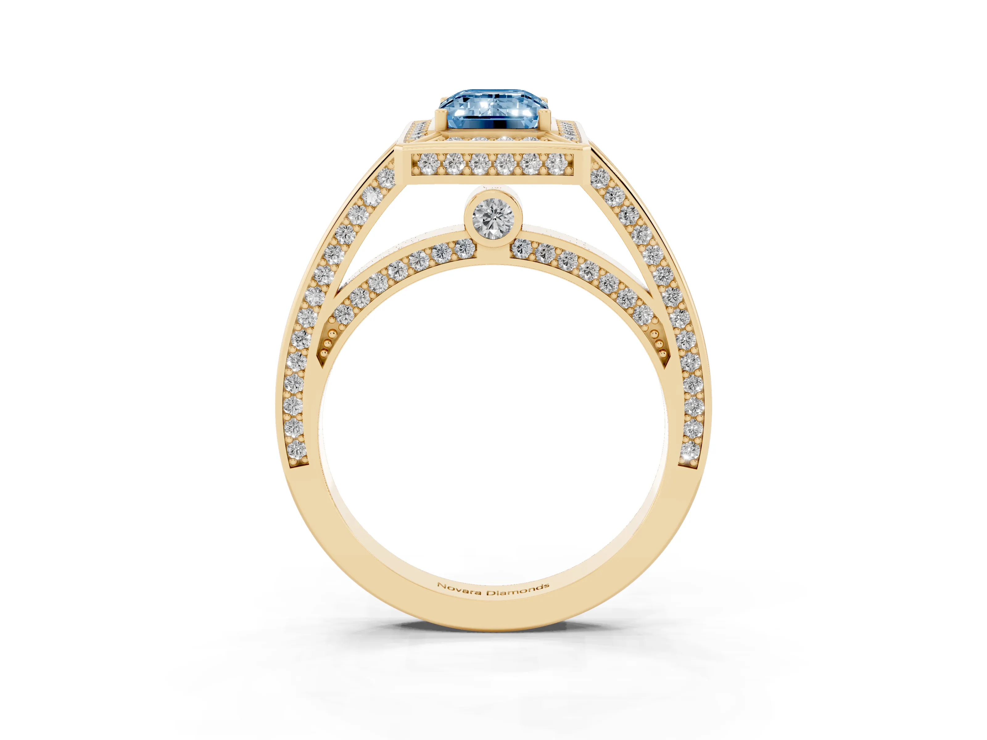 Fancy Blue Emerald Cut Diamond Halo Pavé Split Shank Ring Set in Yellow gold with Prong Setting