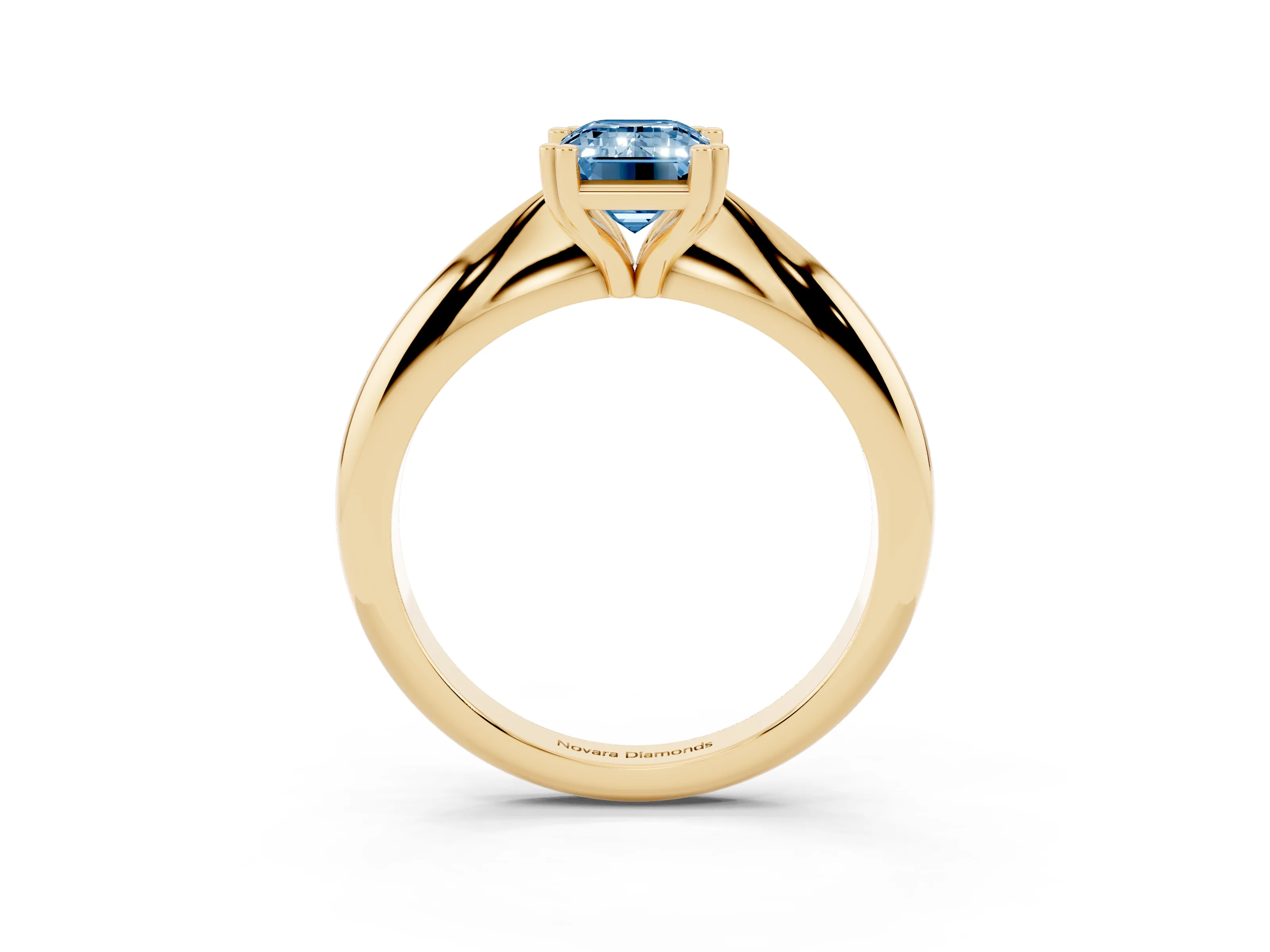 Fancy Blue Emerald Cut Diamond Solitaire Engagement Ring Set in Yellow gold with Tapered Band and Prong Setting