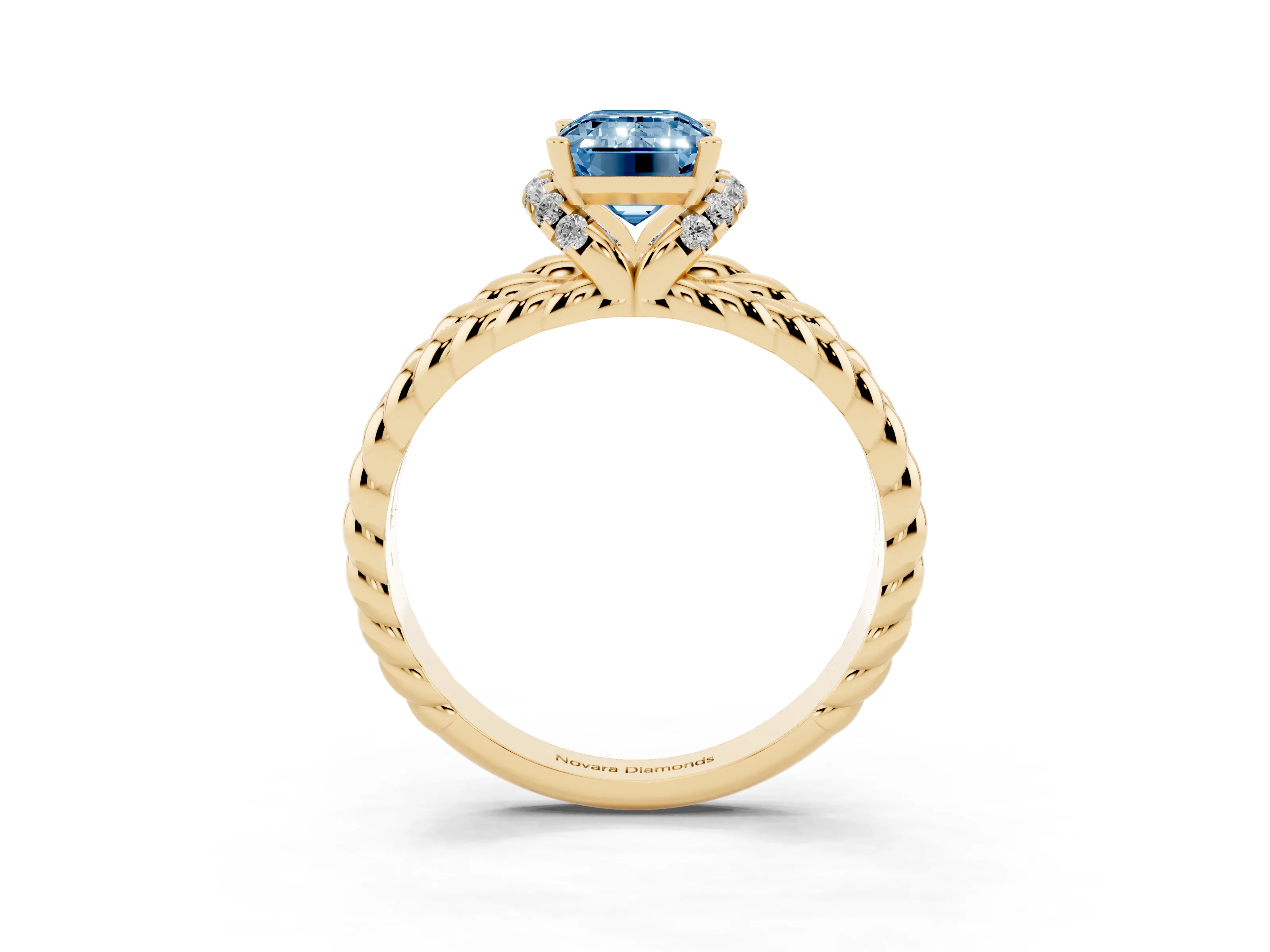 Fancy Blue Emerald Cut Diamond Halo Ring Set in Yellow gold with Twisted Band and Prong Setting