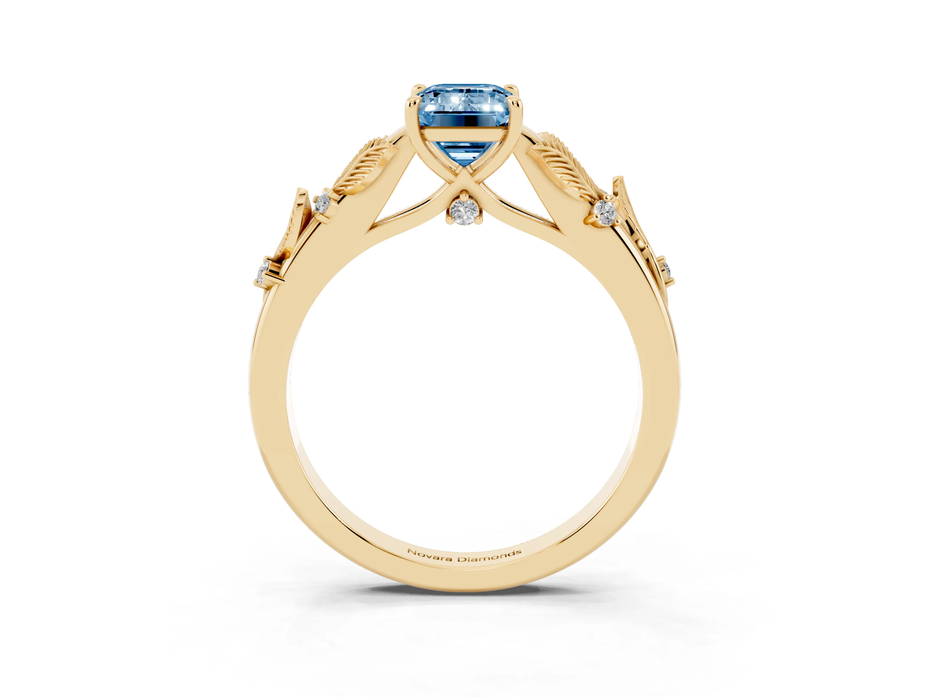 Fancy Blue Emerald Cut Diamond Solitaire Ring Set in Yellow gold with Leaf Motif Band