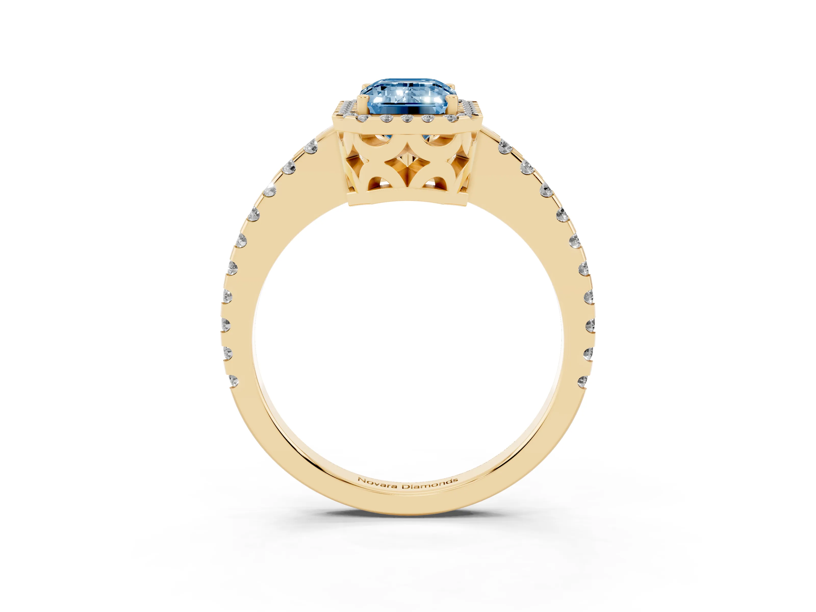 Fancy Blue Emerald Cut Diamond Halo Ring Set in Yellow gold with Pavé Shoulders and Halo-Framed Center