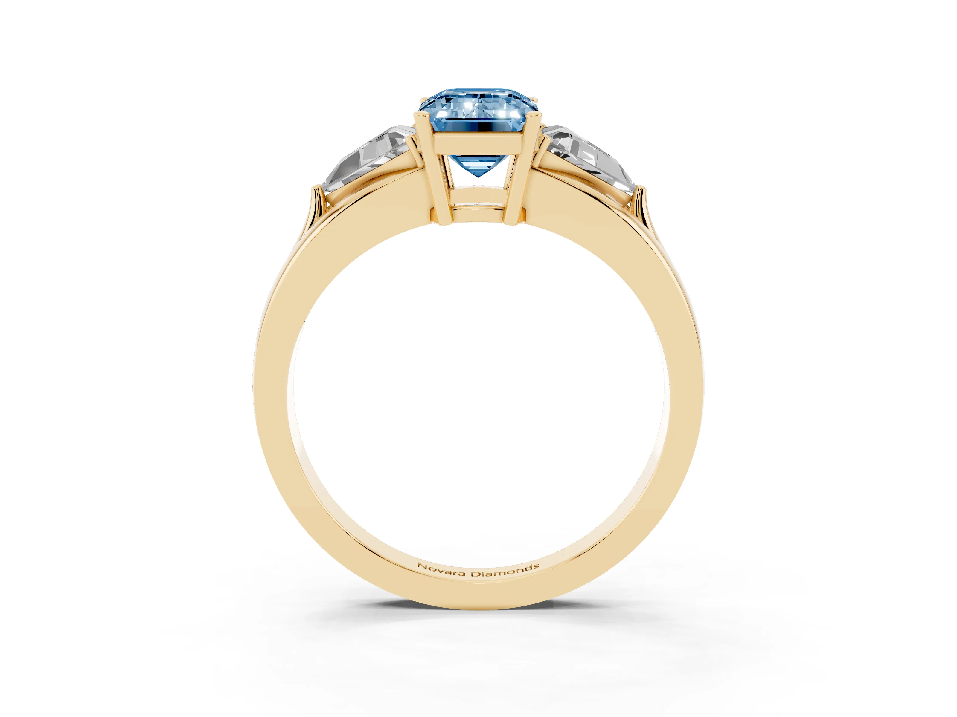Fancy Blue Emerald Cut Diamond Three-Stone Ring Set in Yellow gold with Trillion Side Stones and Split Shank