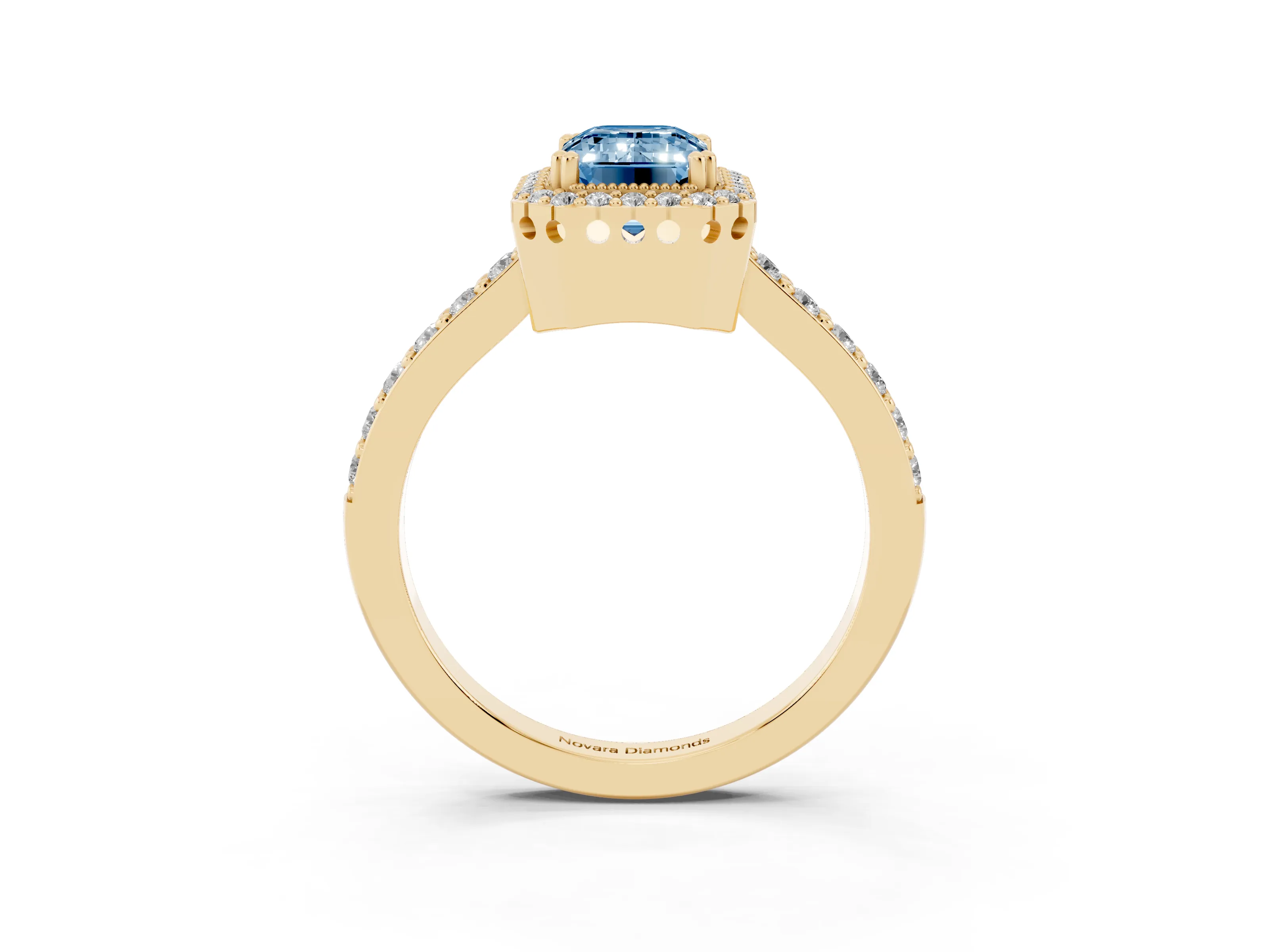 Fancy Blue Emerald Cut Diamond Halo Engagement Ring Set in Yellow gold with Milgrain Detail and Pavé Band