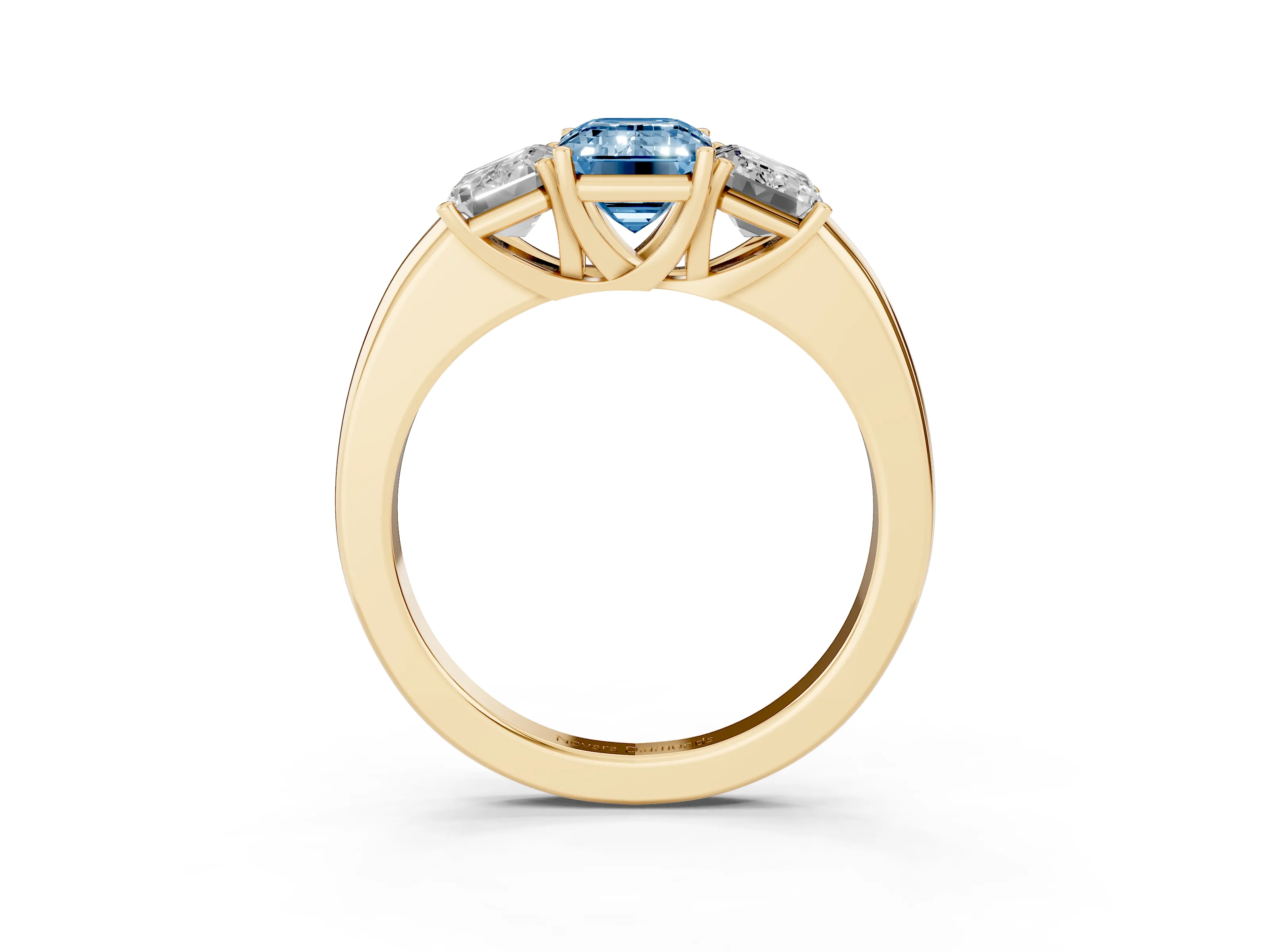 Fancy Blue Emerald Cut Diamond Three-Stone Ring Set in Yellow gold with Bold Center and Classic Band
