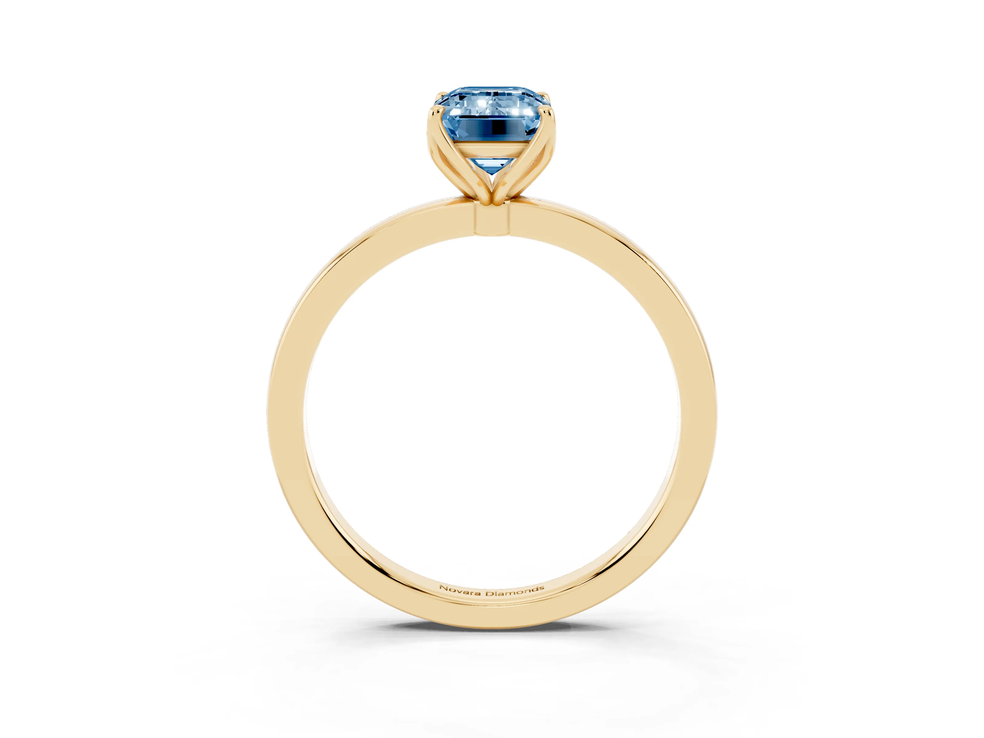 Fancy Blue Emerald Cut Diamond Solitaire Ring Set in Yellow gold with Prong Setting and Thin Polished Band