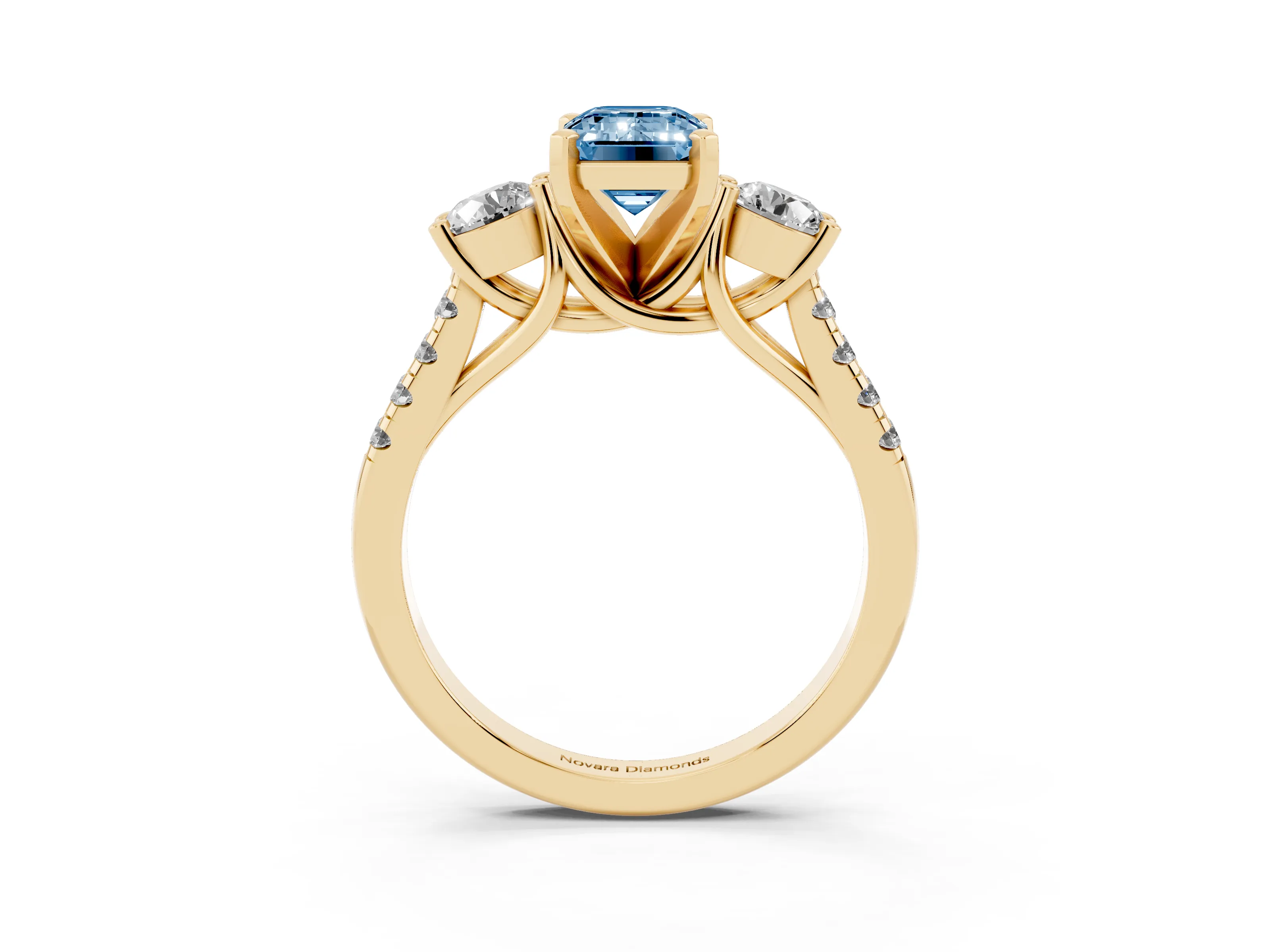 Fancy Blue Three-Stone Emerald Cut Diamond Pavé Band Ring Set in Yellow gold with Prong-Set Trio