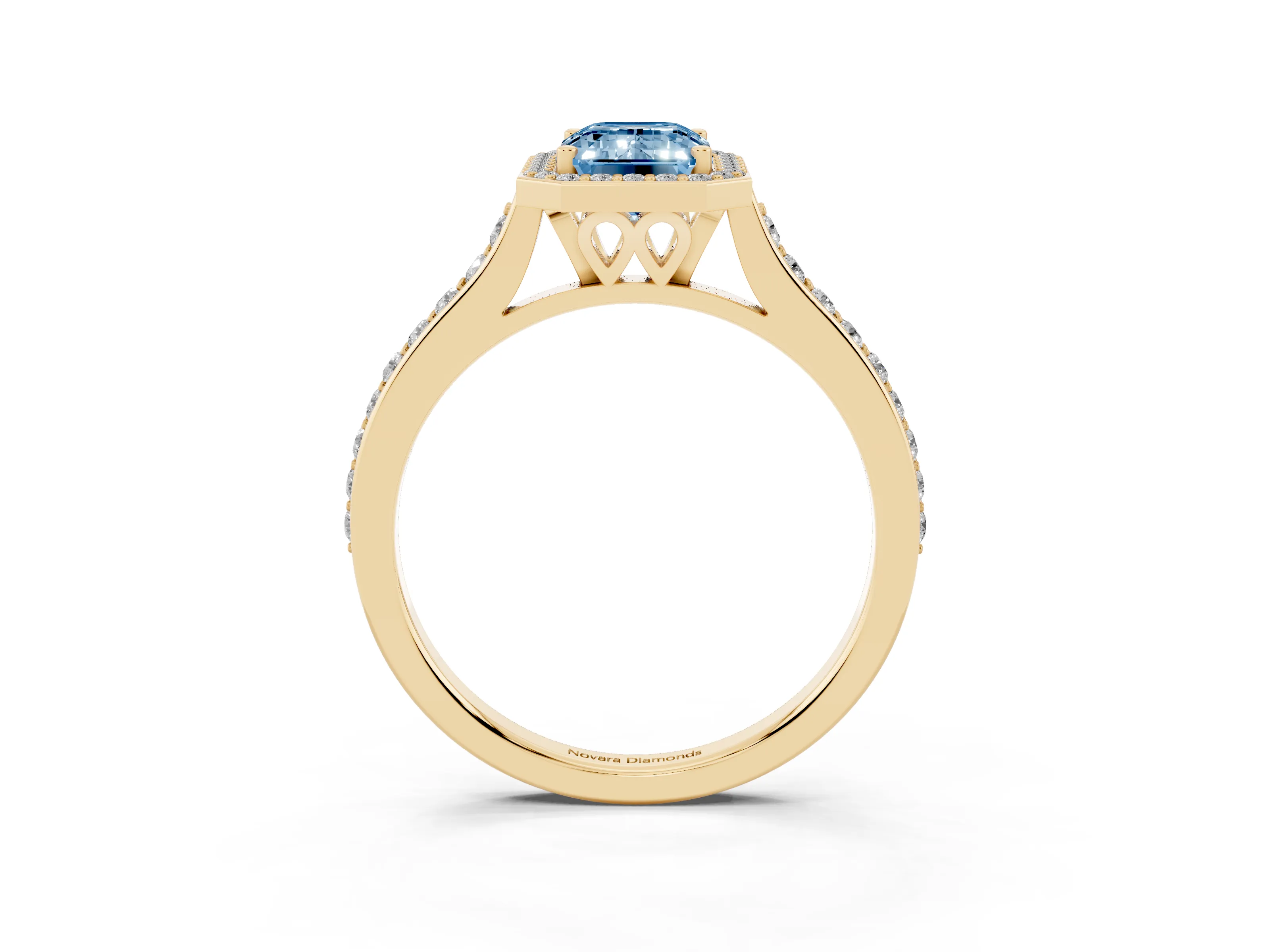 Fancy Blue Emerald Cut Diamond Halo Engagement Ring Set in Yellow gold with Round Pavé Shoulders and Heart Gallery