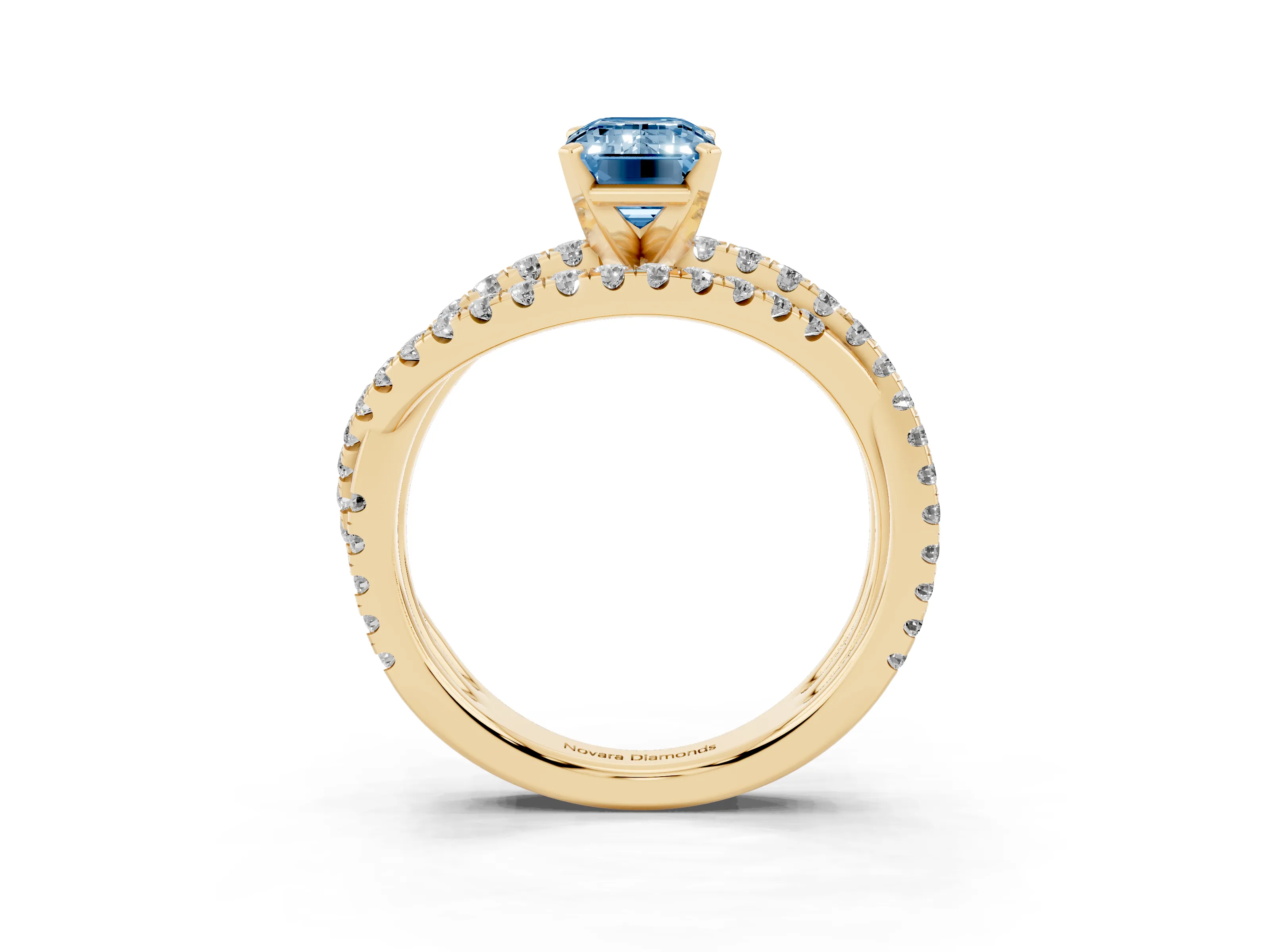 Fancy Blue Emerald Cut Diamond Solitaire Twist Band Ring Set in Yellow gold with Pavé Setting and Prong Head