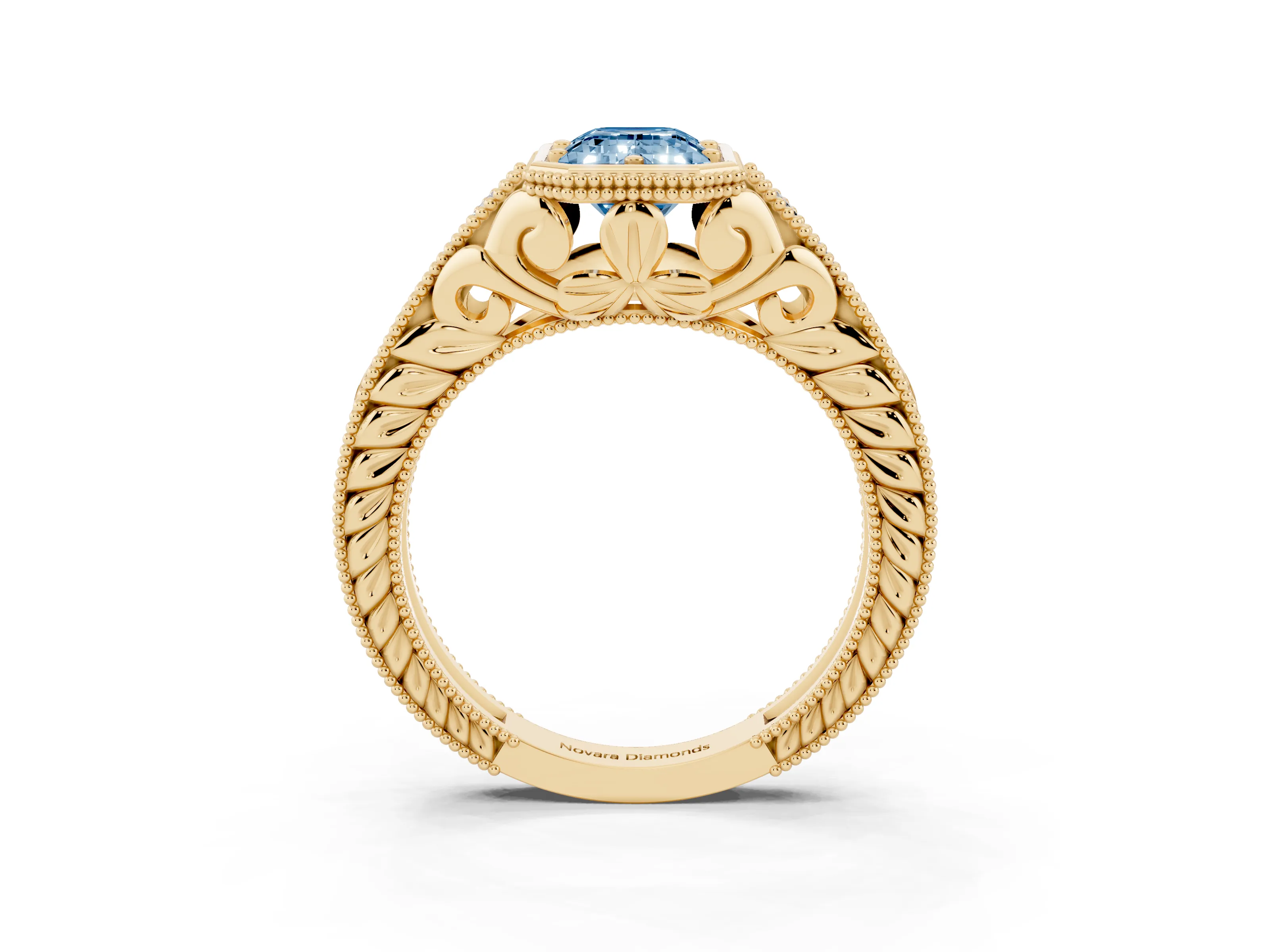 Fancy Blue Bezel Set Emerald Cut Diamond Milgrain Pavé Engagement Ring Set in Yellow gold