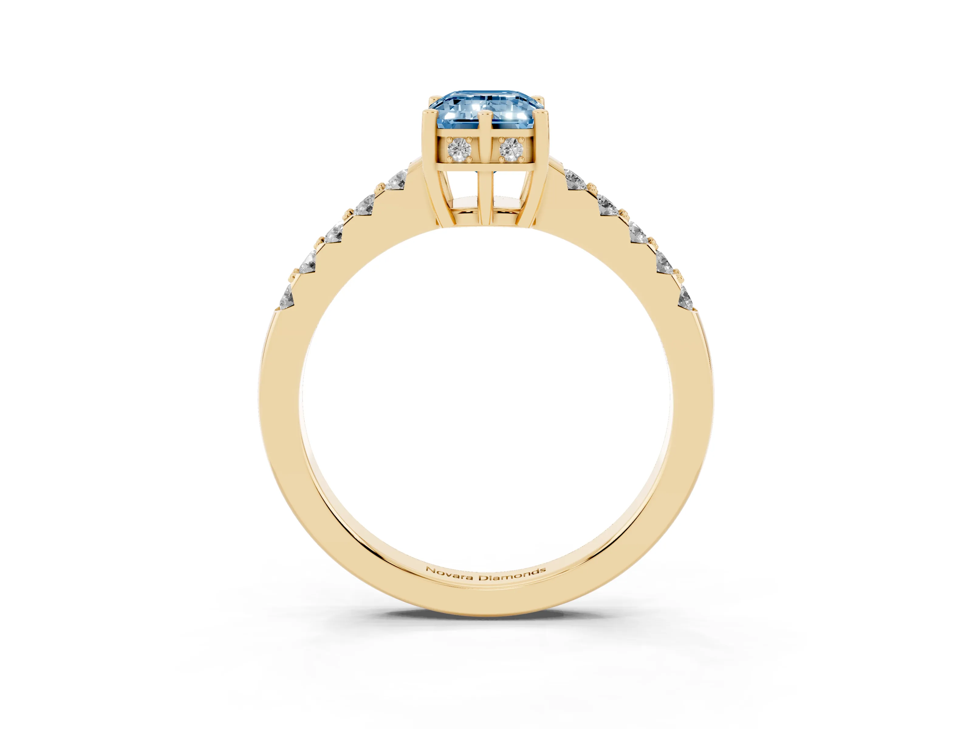 Fancy Blue Emerald Cut Diamond Solitaire Engagement Ring Set in Yellow gold with Pavé Band and Prong Setting
