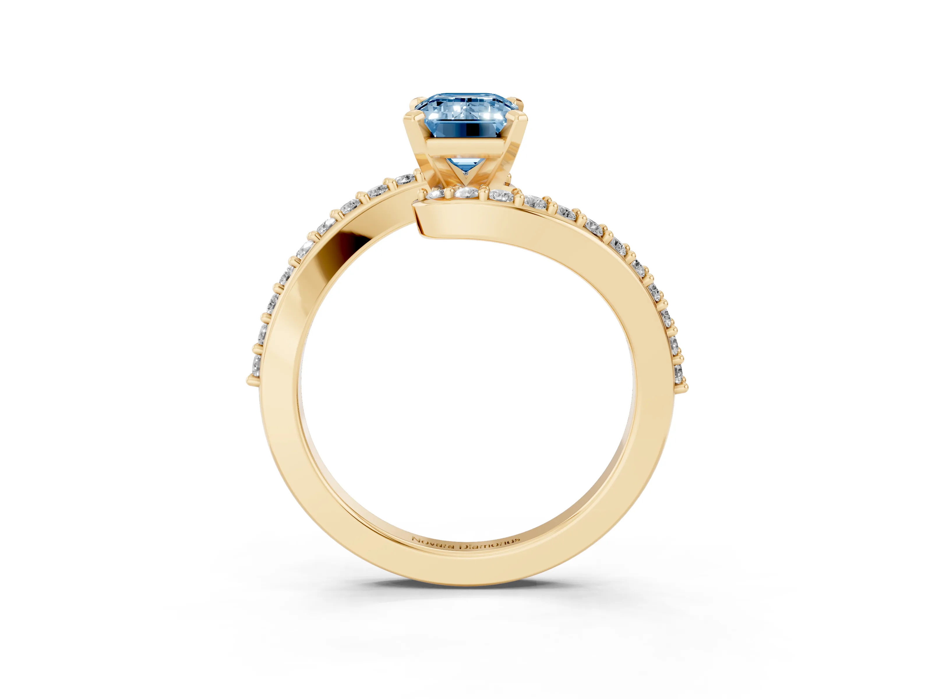 Fancy Blue Emerald Cut Diamond Solitaire Ring Set in Yellow gold with Pavé Twist Band and Prong Setting