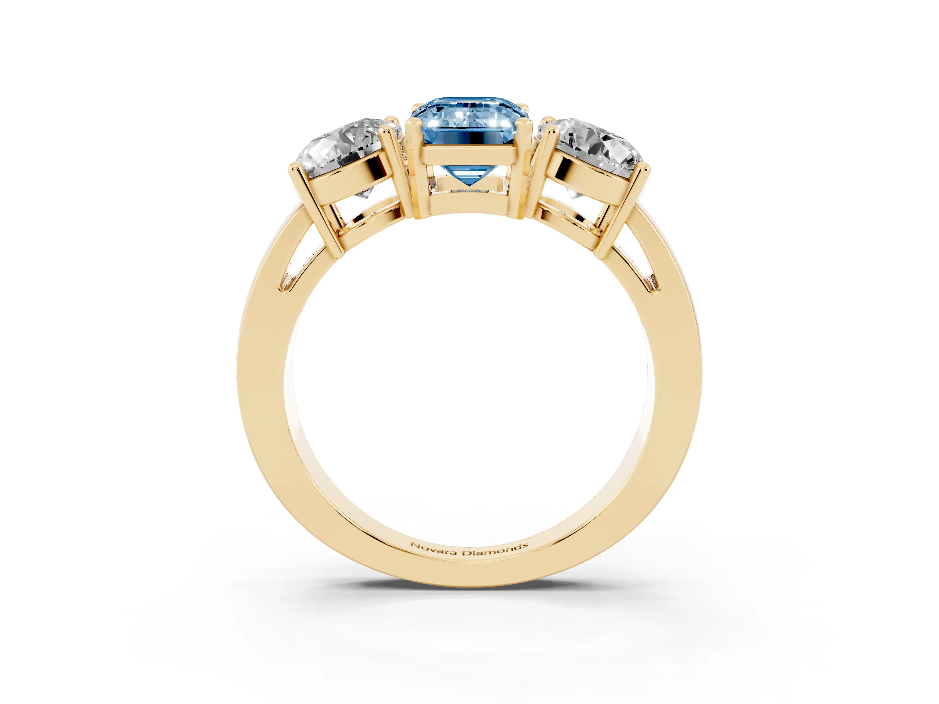 Fancy Blue Emerald Cut Diamond Three-Stone Ring Set in Yellow gold with Round Side Stones and Classic Band