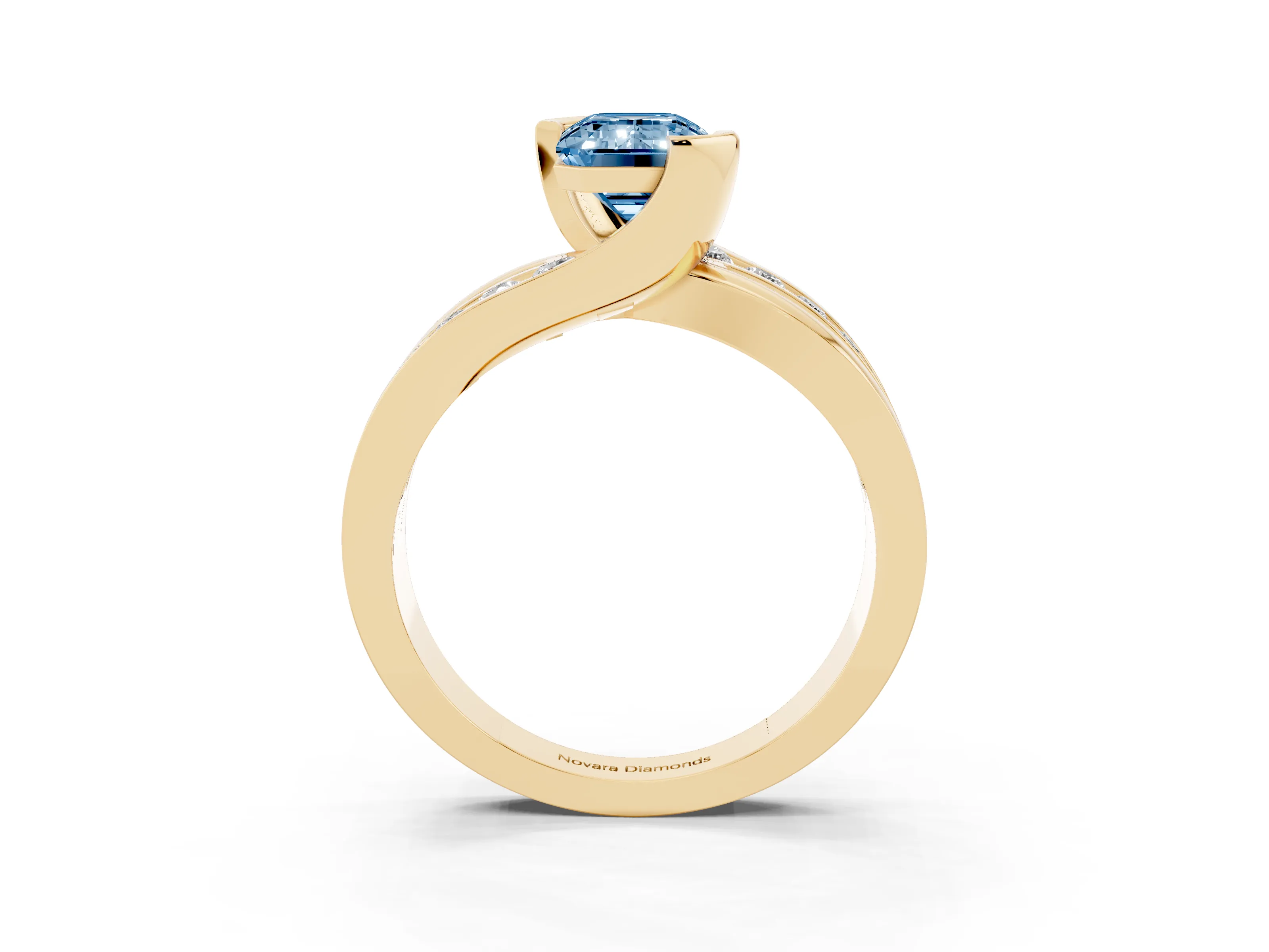 Fancy Blue Emerald Cut Diamond Solitaire Ring Set in Yellow gold with Channel Set Split Shank and Tension Prongs