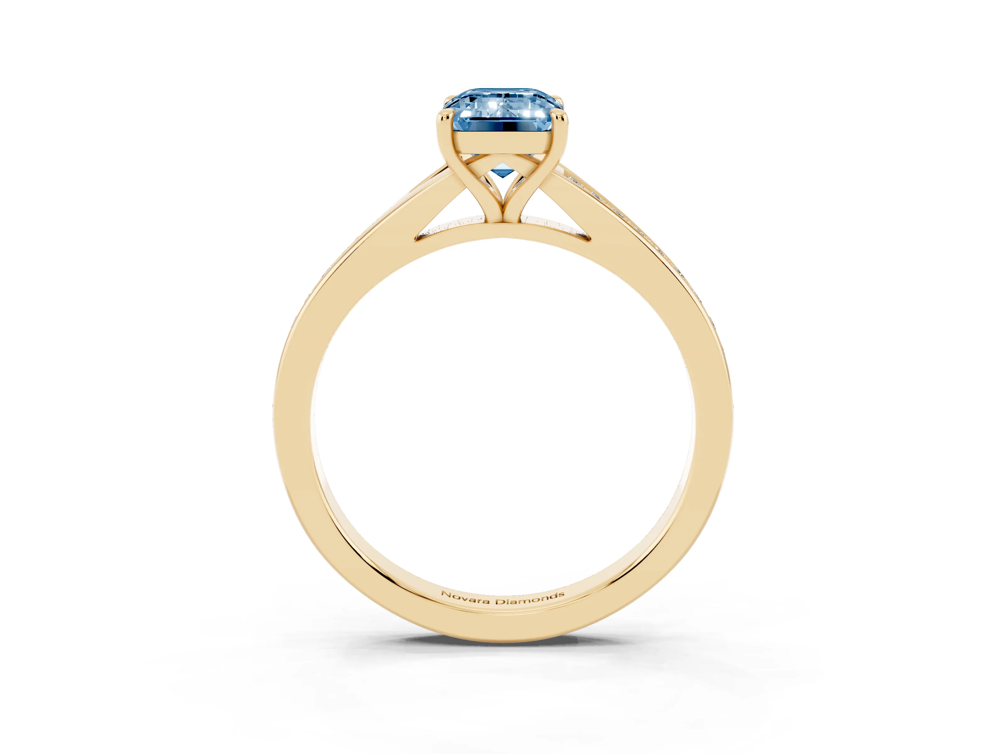 Fancy Blue Emerald Cut Diamond Solitaire Ring Set in Yellow gold with Pavé Accent Band and Classic Prong Setting