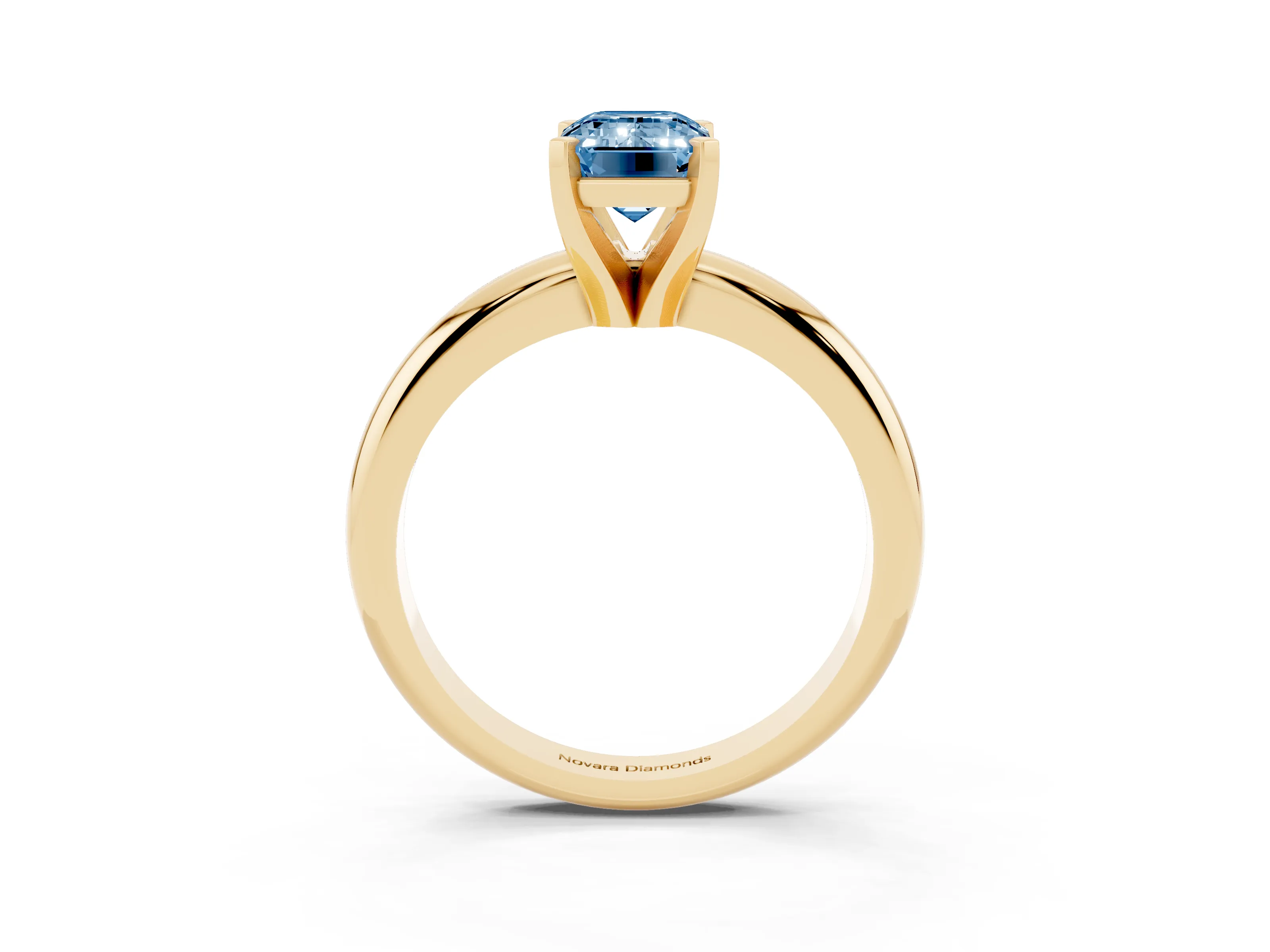 Fancy Blue Emerald Cut Diamond Solitaire Engagement Ring Set in Yellow gold with Round Band and Prong Setting