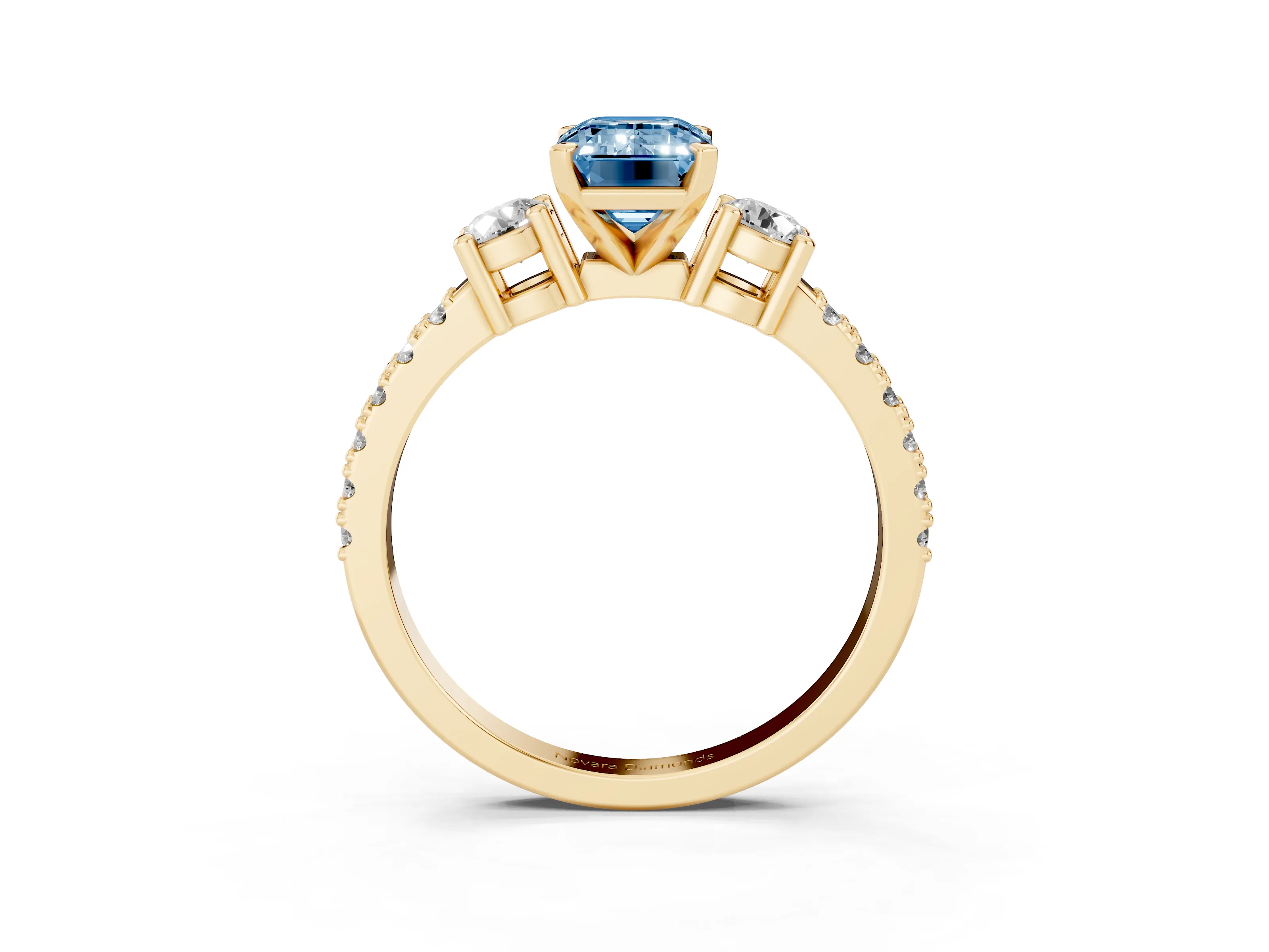 Fancy Blue Three-Stone Emerald Cut Diamond Pavé Band Ring Set in Yellow gold with Prong Setting