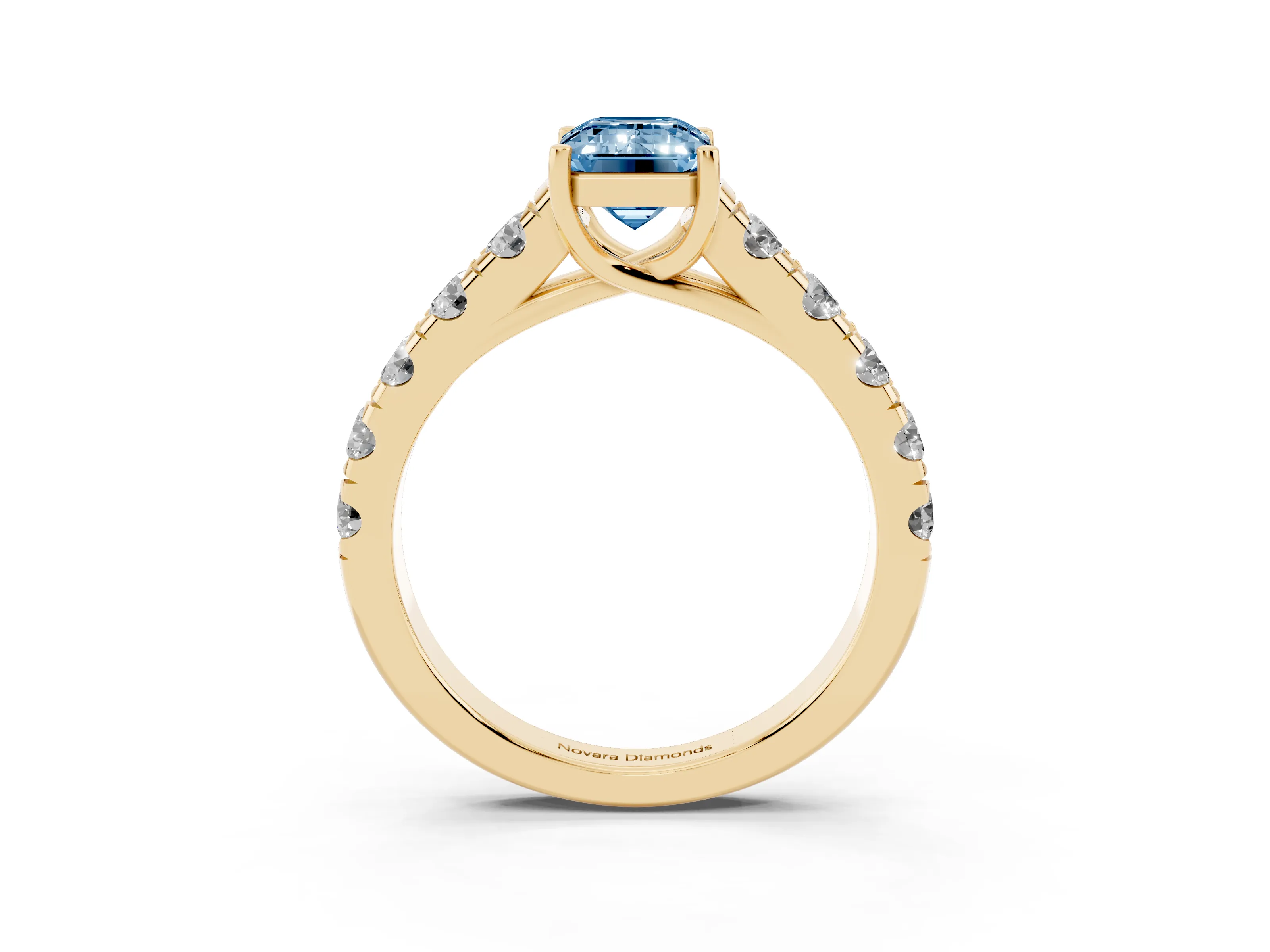 Fancy Blue Emerald Cut Diamond Solitaire Ring Set in Yellow gold with Cut-Down Micro Pavé Band and Prong Setting