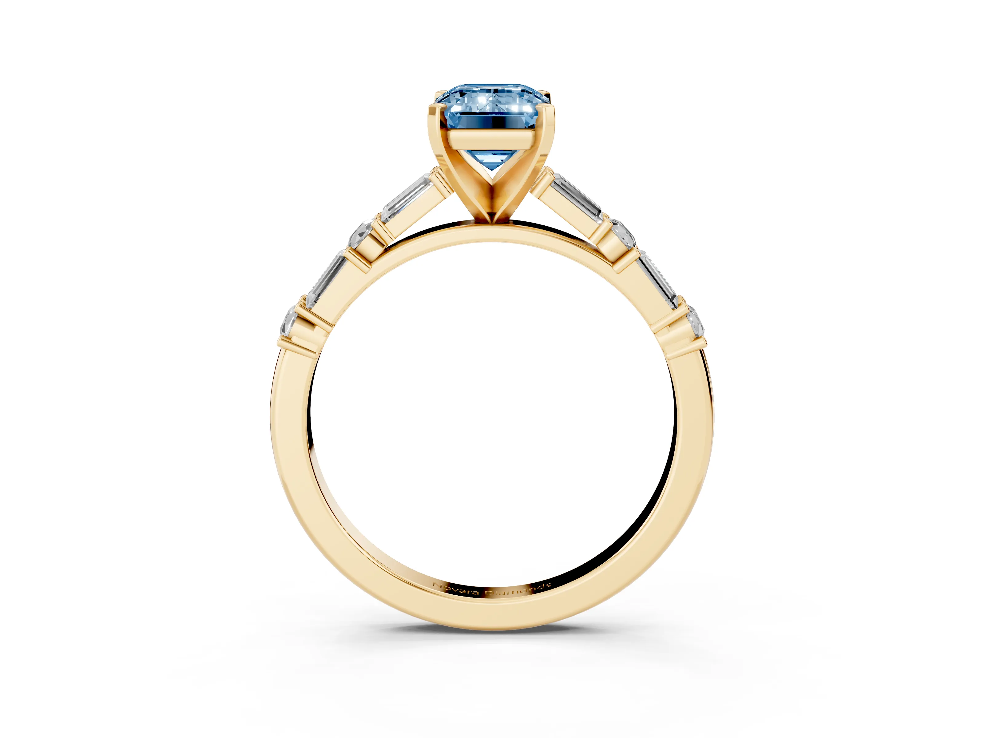 Fancy Blue Emerald Cut Diamond Solitaire Set in Yellow gold with Side Baguettes and Channel Set Band