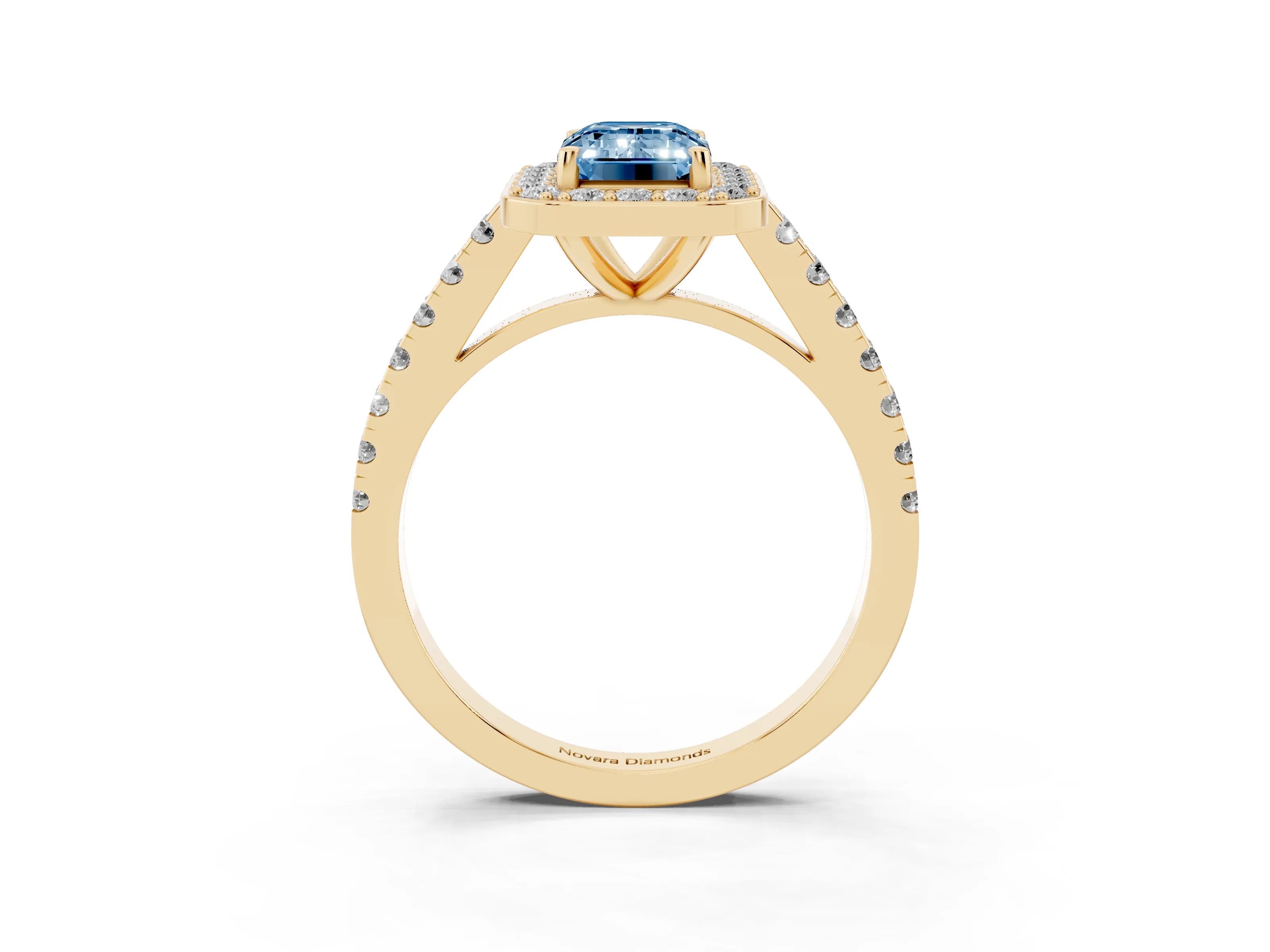 Fancy Blue Emerald Cut Diamond Halo Ring Set in Yellow gold with Round Pavé Split Shank and Prong Setting