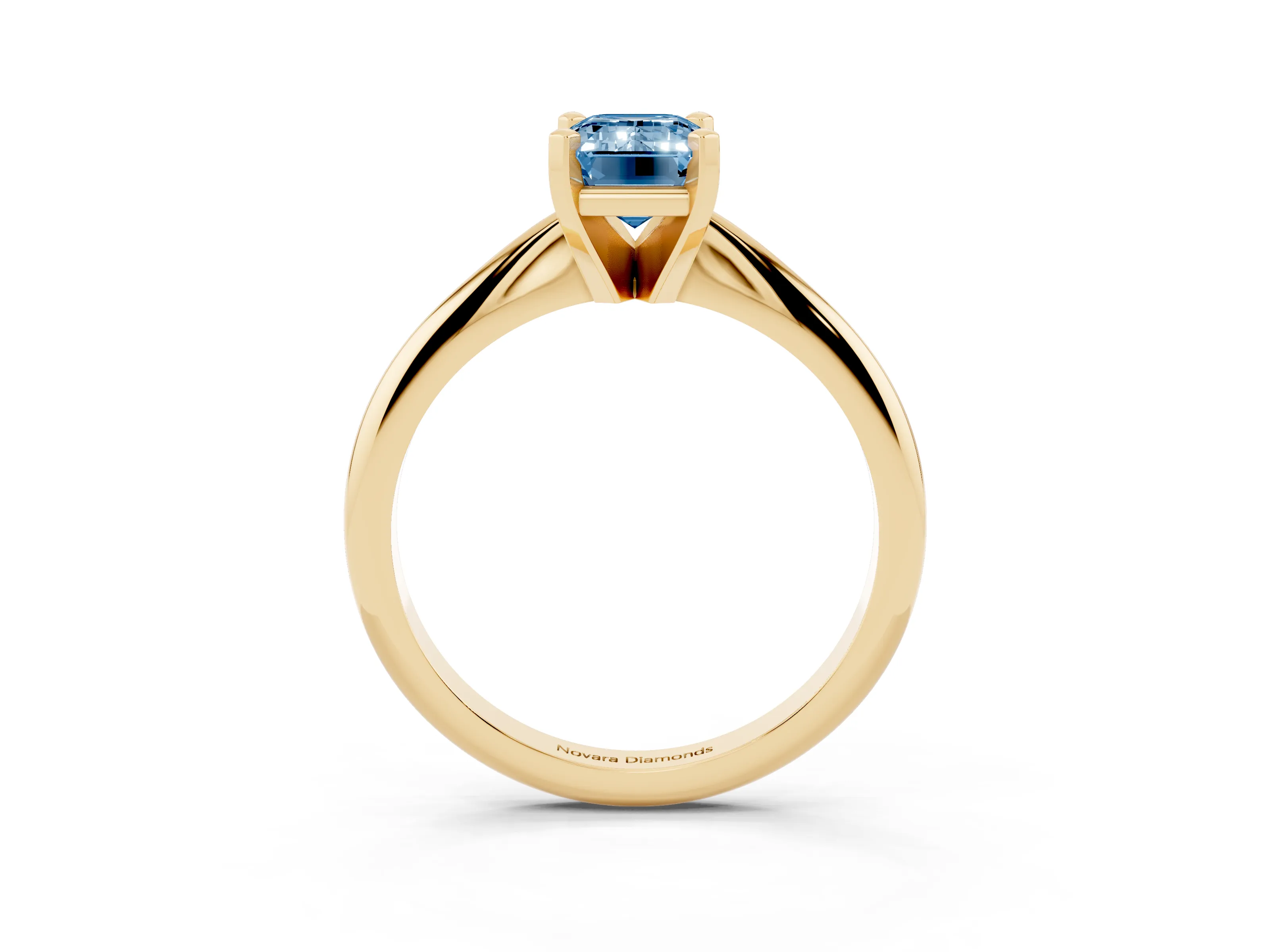 Fancy Blue Emerald Cut Diamond Solitaire Ring Set in Yellow gold with Prong Setting on a Plain Round Band
