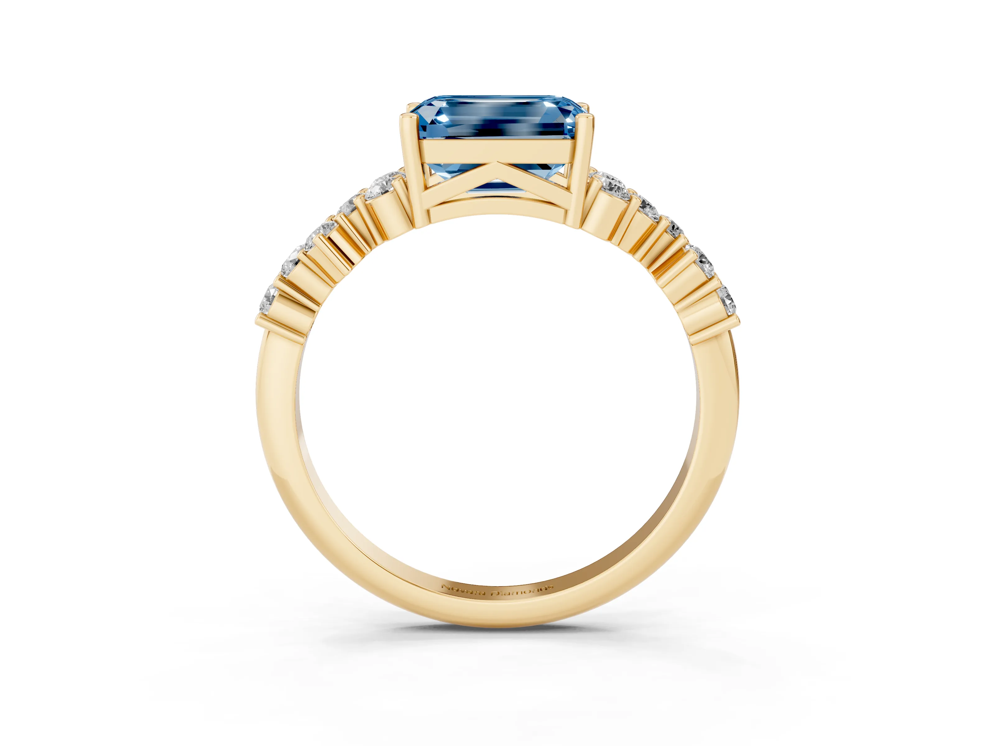 Fancy Blue Emerald Cut Diamond Ring Set in Yellow gold with Scattered Round Accents