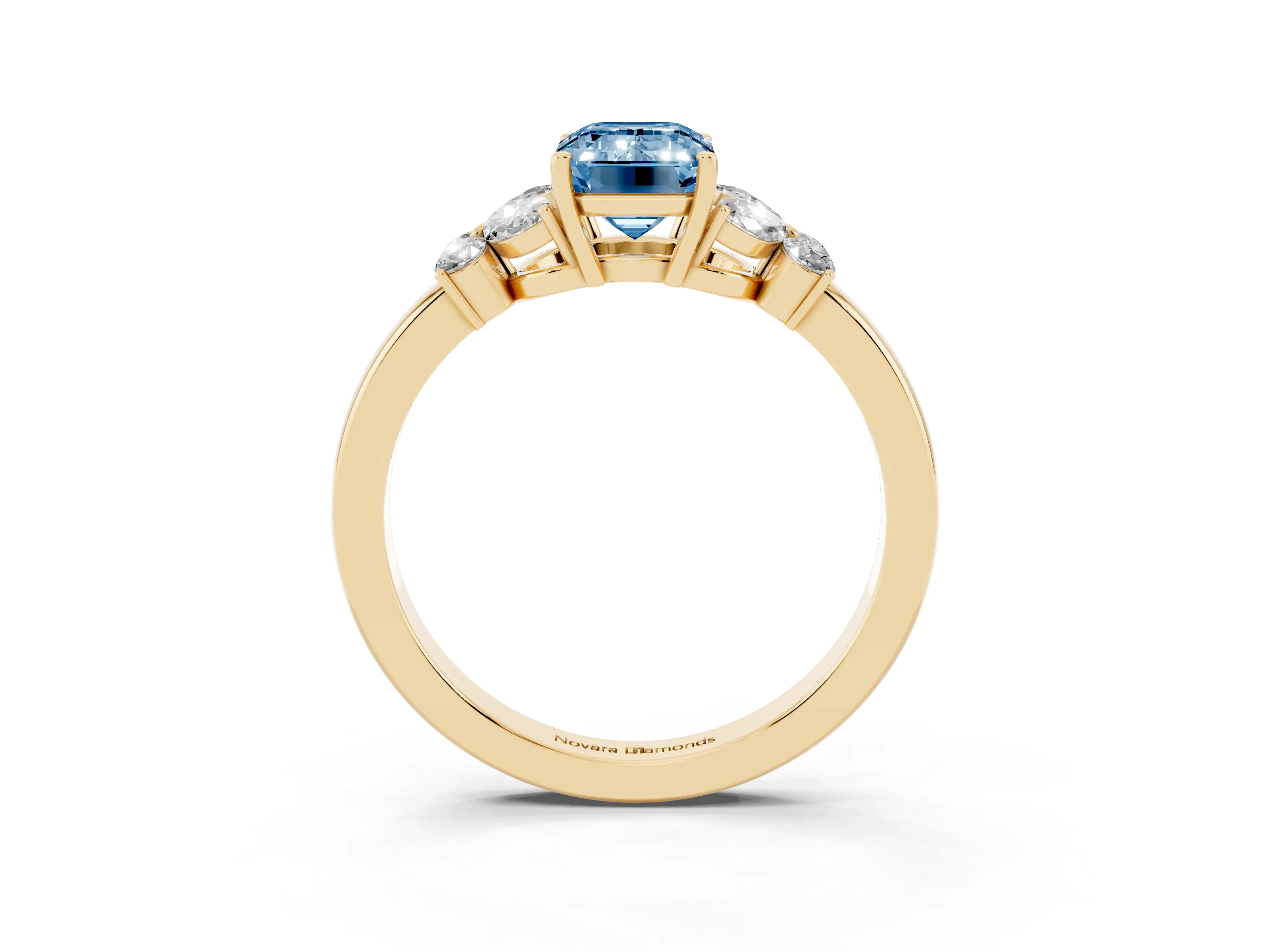 Fancy Blue Emerald Cut Diamond Solitaire Floral Ring Set in Yellow gold with Marquise Petals and Prong Setting