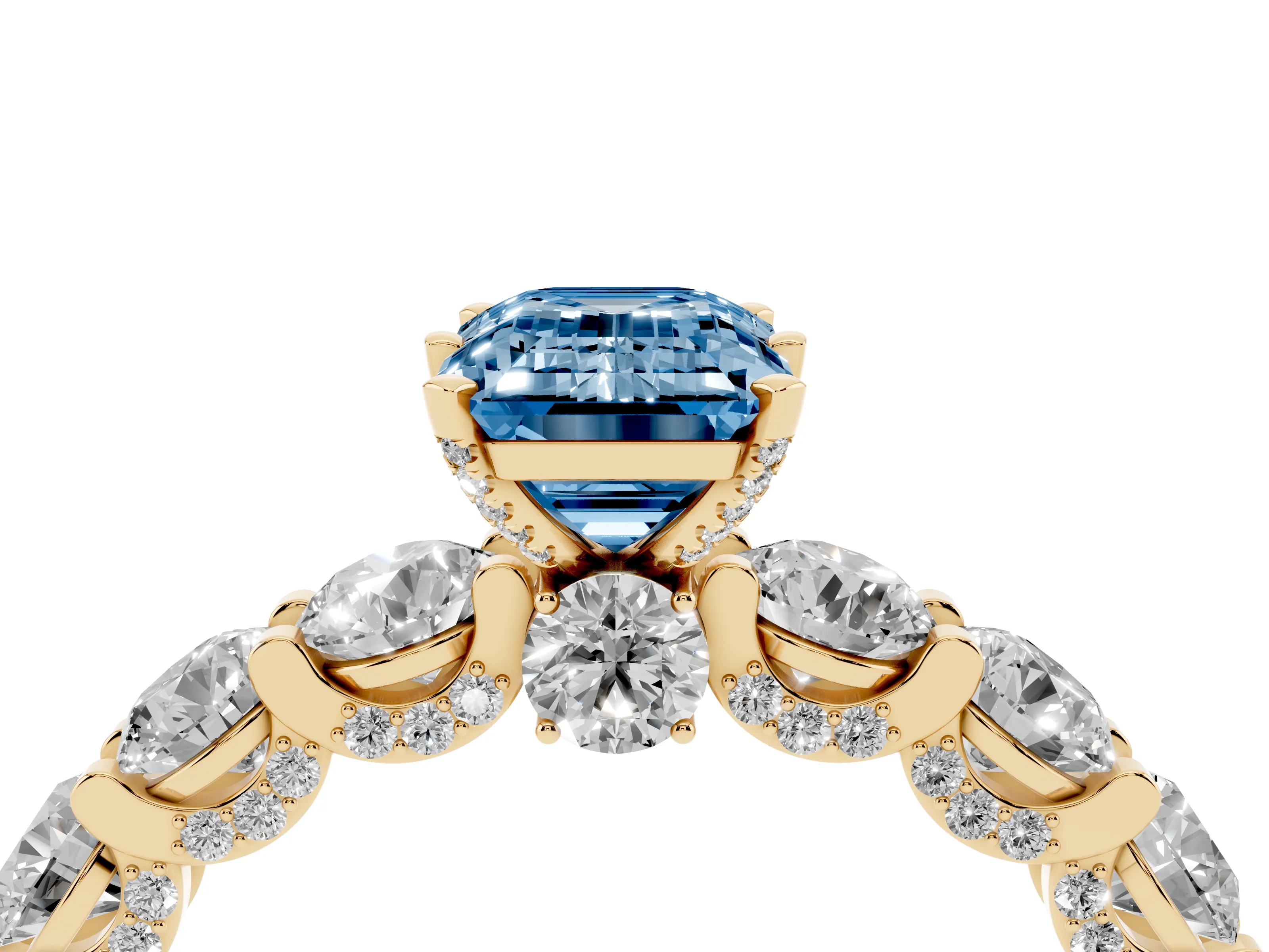 Fancy Blue Emerald Cut Diamond Side Stone Ring Set in Yellow gold with Alternating Round and Oval Side Stones