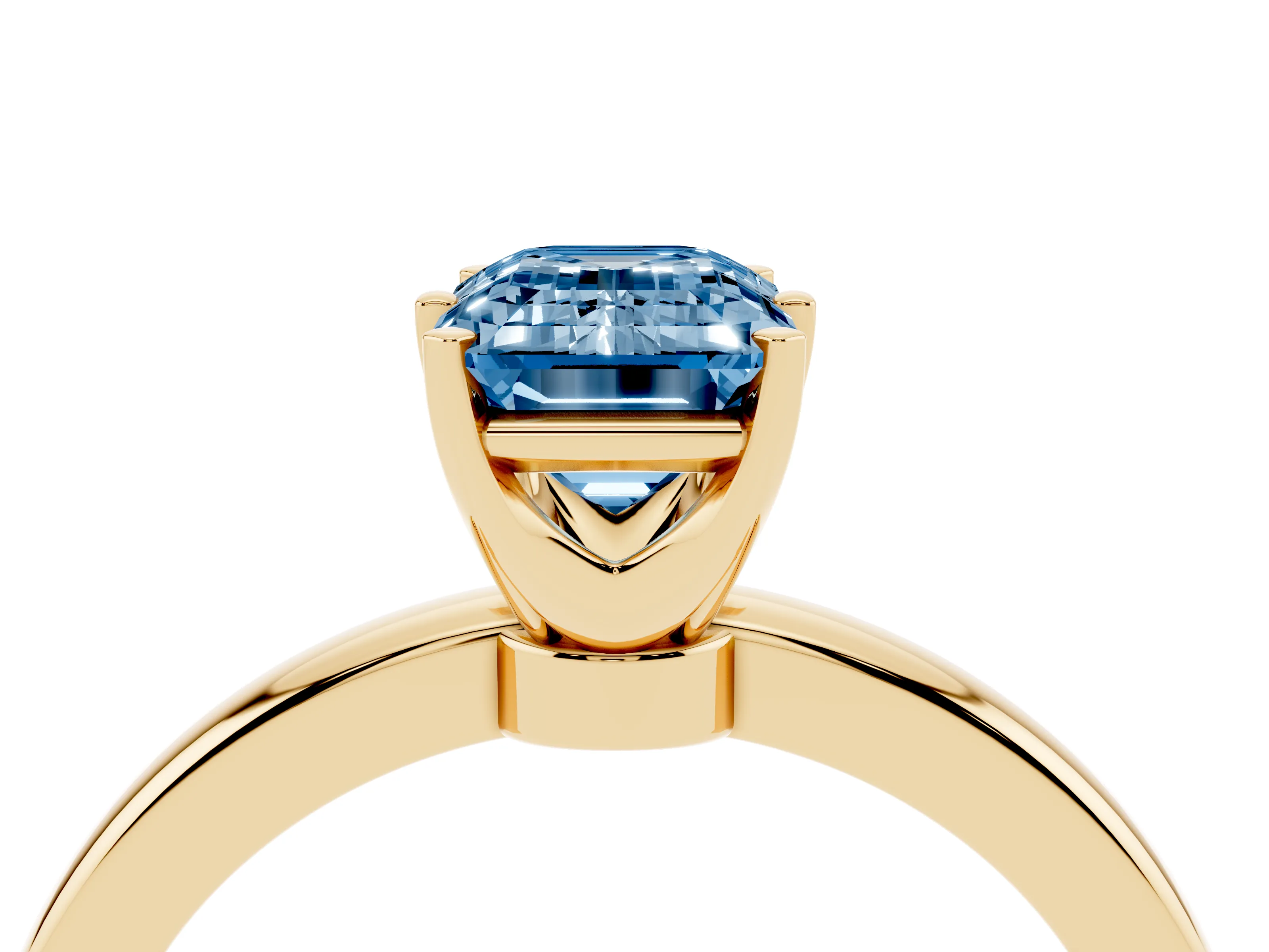 Fancy Blue Emerald Cut Diamond Solitaire Ring Set in Yellow gold with Raised Prong Setting on a Classic Band