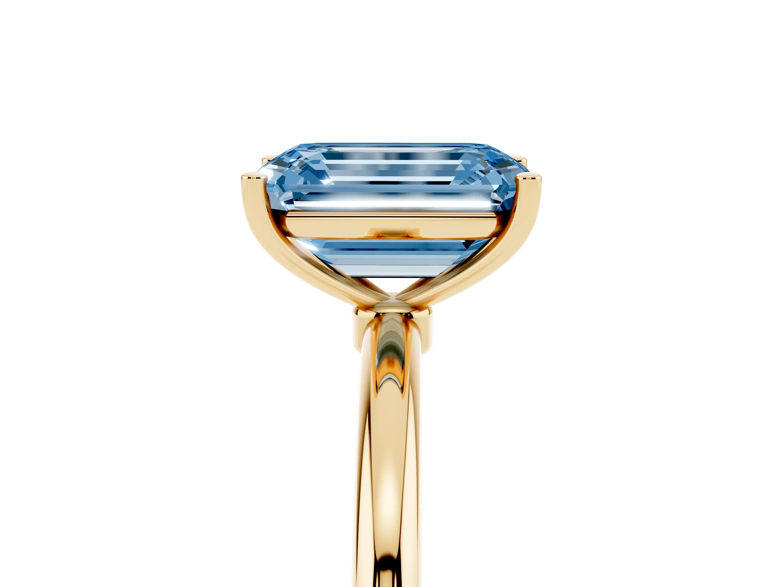 Fancy Blue Emerald Cut Diamond Solitaire Engagement Ring Set in Yellow gold with Thin Band and Prong Setting