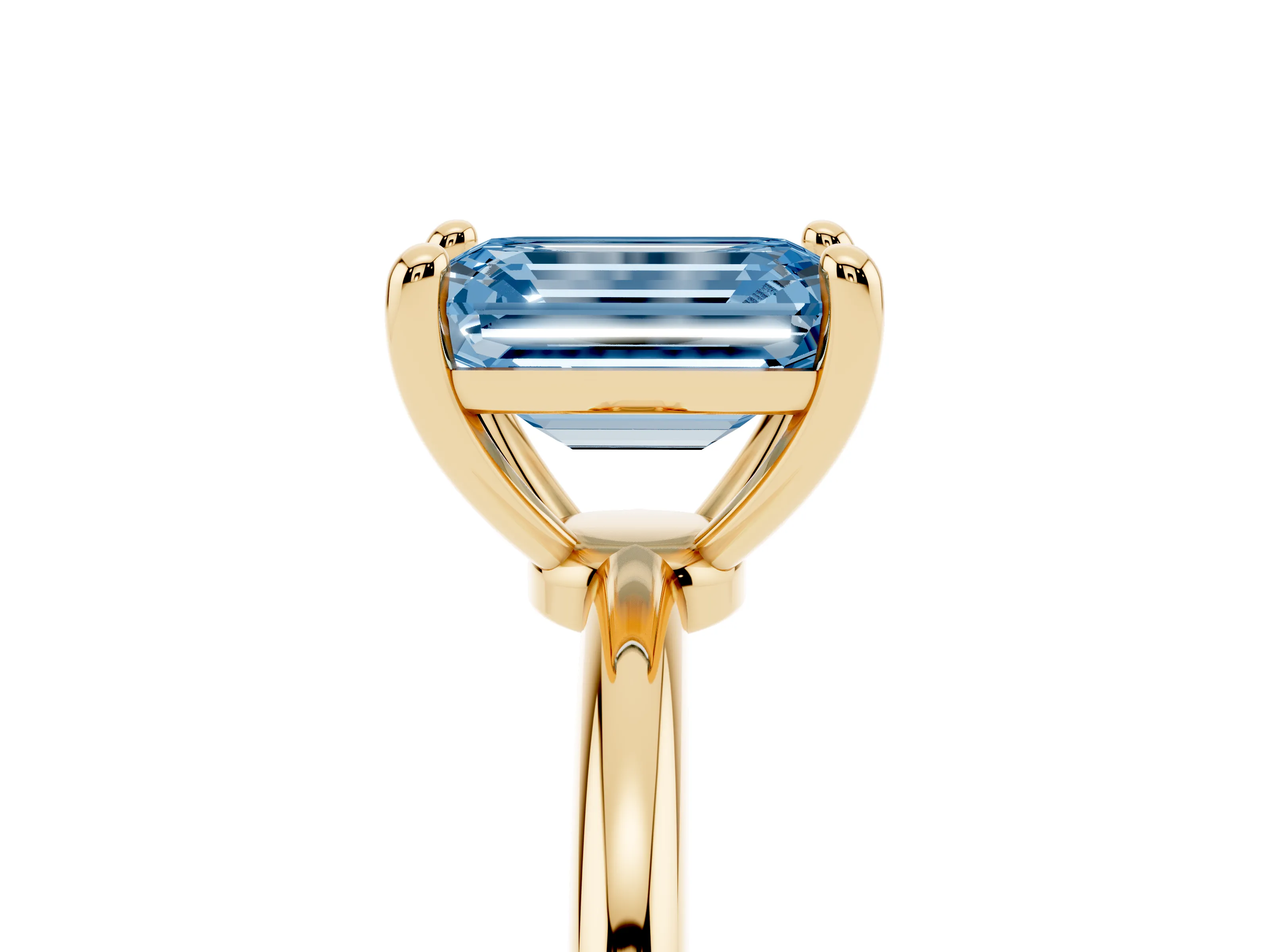 Fancy Blue Emerald Cut Diamond Solitaire Ring Set in Yellow gold with Secure Prong Setting on a Classic Band