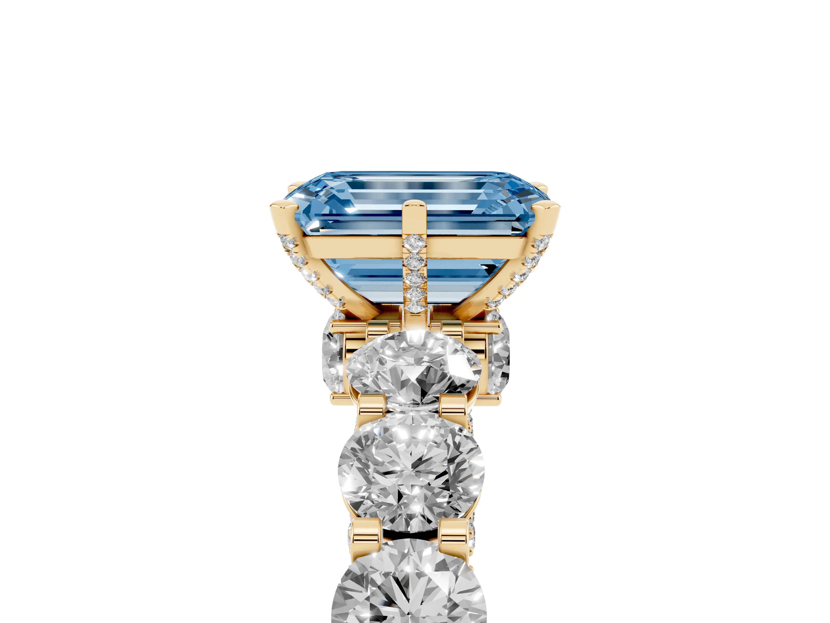 Fancy Blue Emerald Cut Diamond Side Stone Ring Set in Yellow gold with Alternating Round and Oval Side Stones
