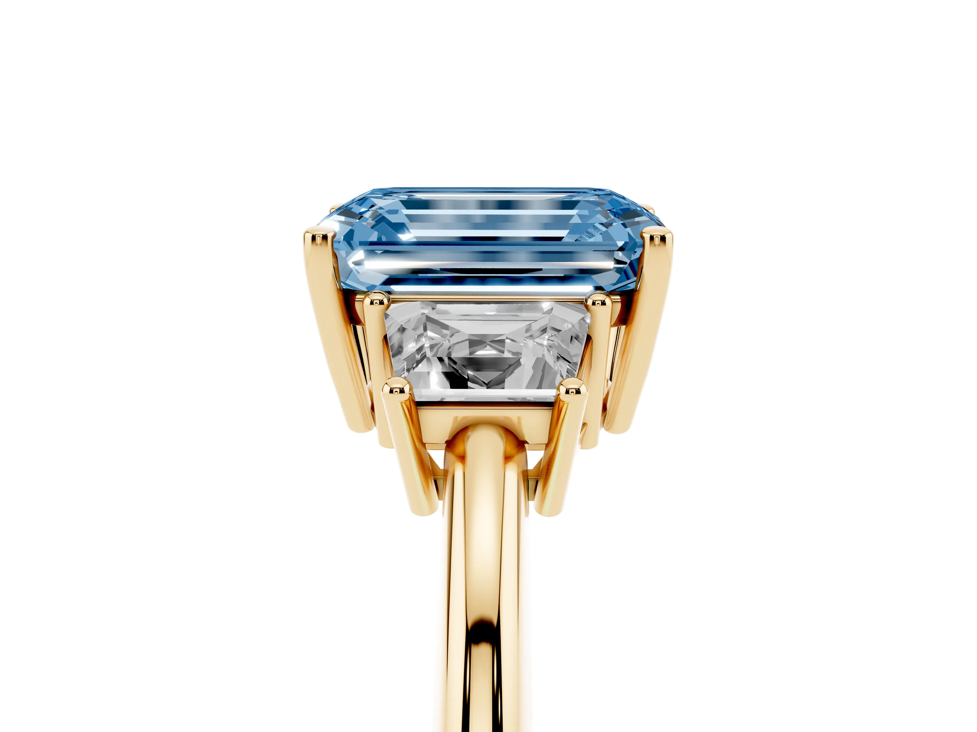 Fancy Blue Emerald Cut Diamond Three-Stone Ring Set in Yellow gold with Trapezoid Side Stones and Prong Setting