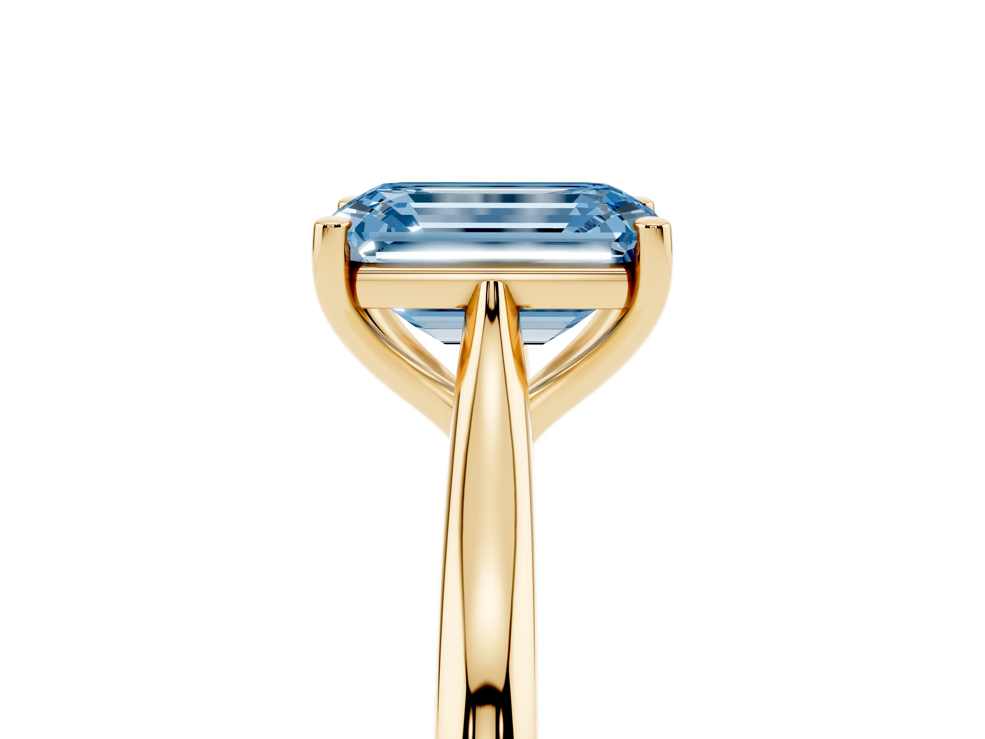 Fancy Blue Emerald Cut Diamond Solitaire Ring Set in Yellow gold with Cathedral Band and Prong Setting