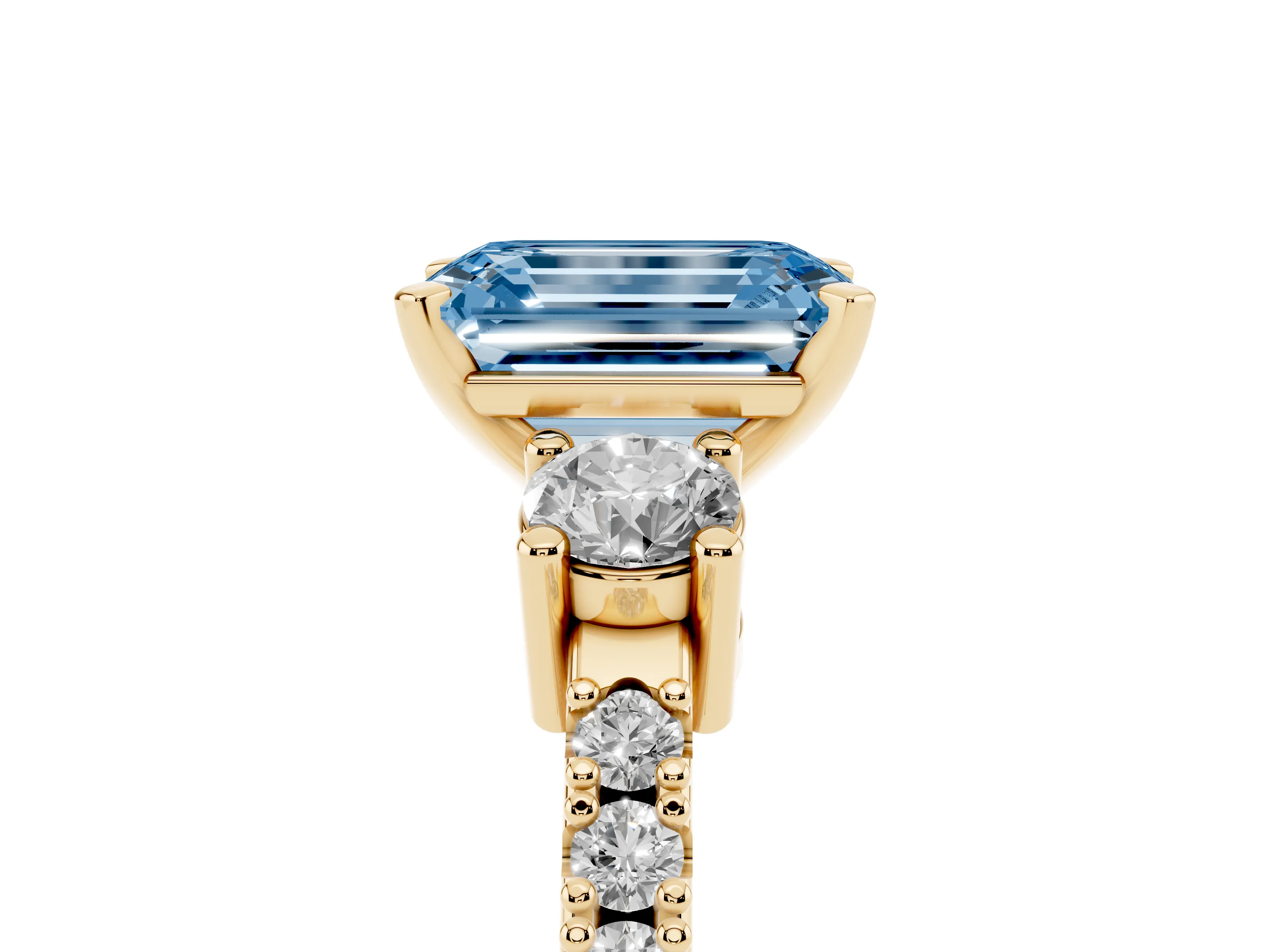 Fancy Blue Three-Stone Emerald Cut Diamond Pavé Band Ring Set in Yellow gold with Prong Setting