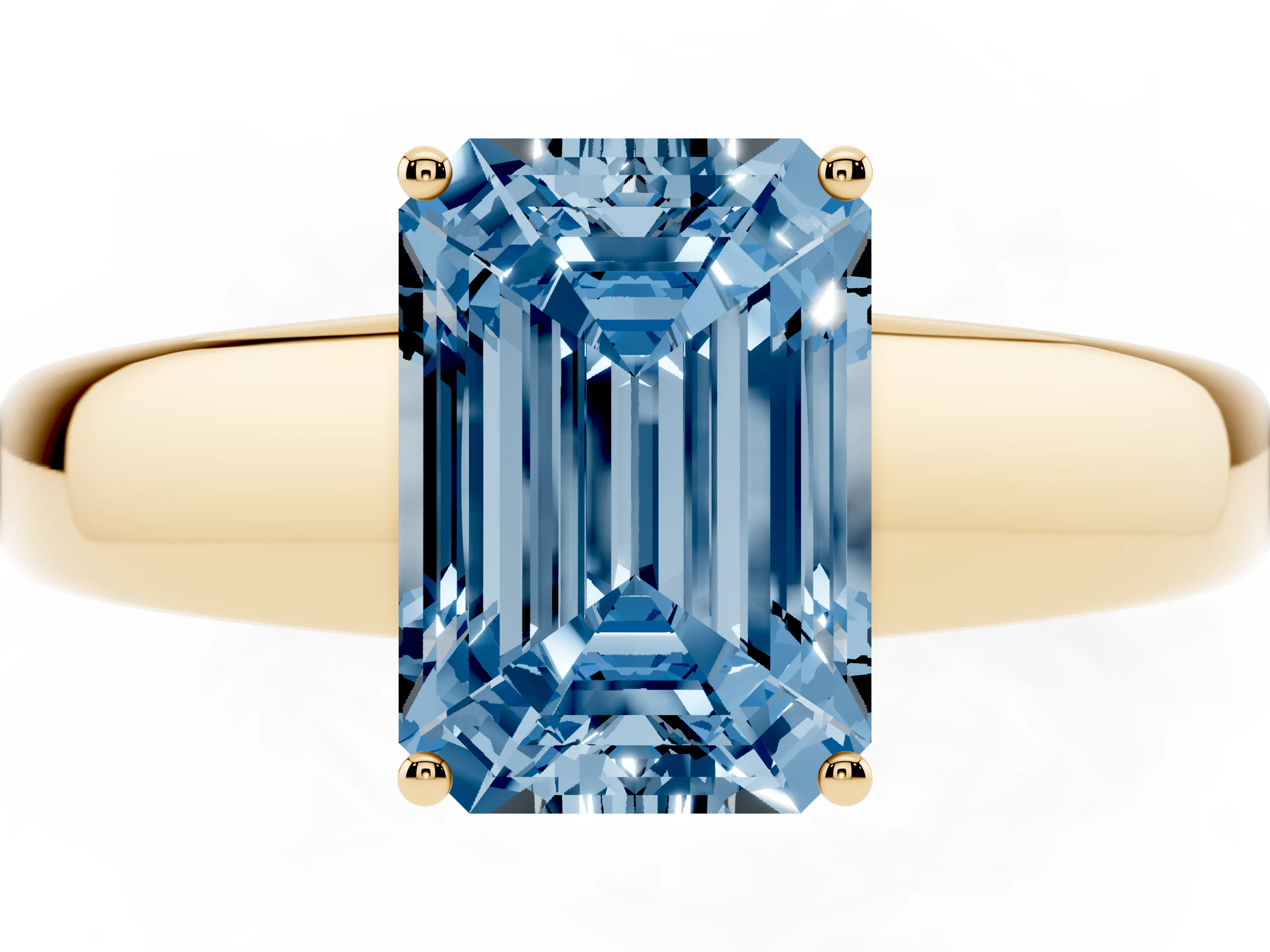 Fancy Blue Emerald Cut Diamond Solitaire Ring Set in Yellow gold with Tapered Band and Prong Setting