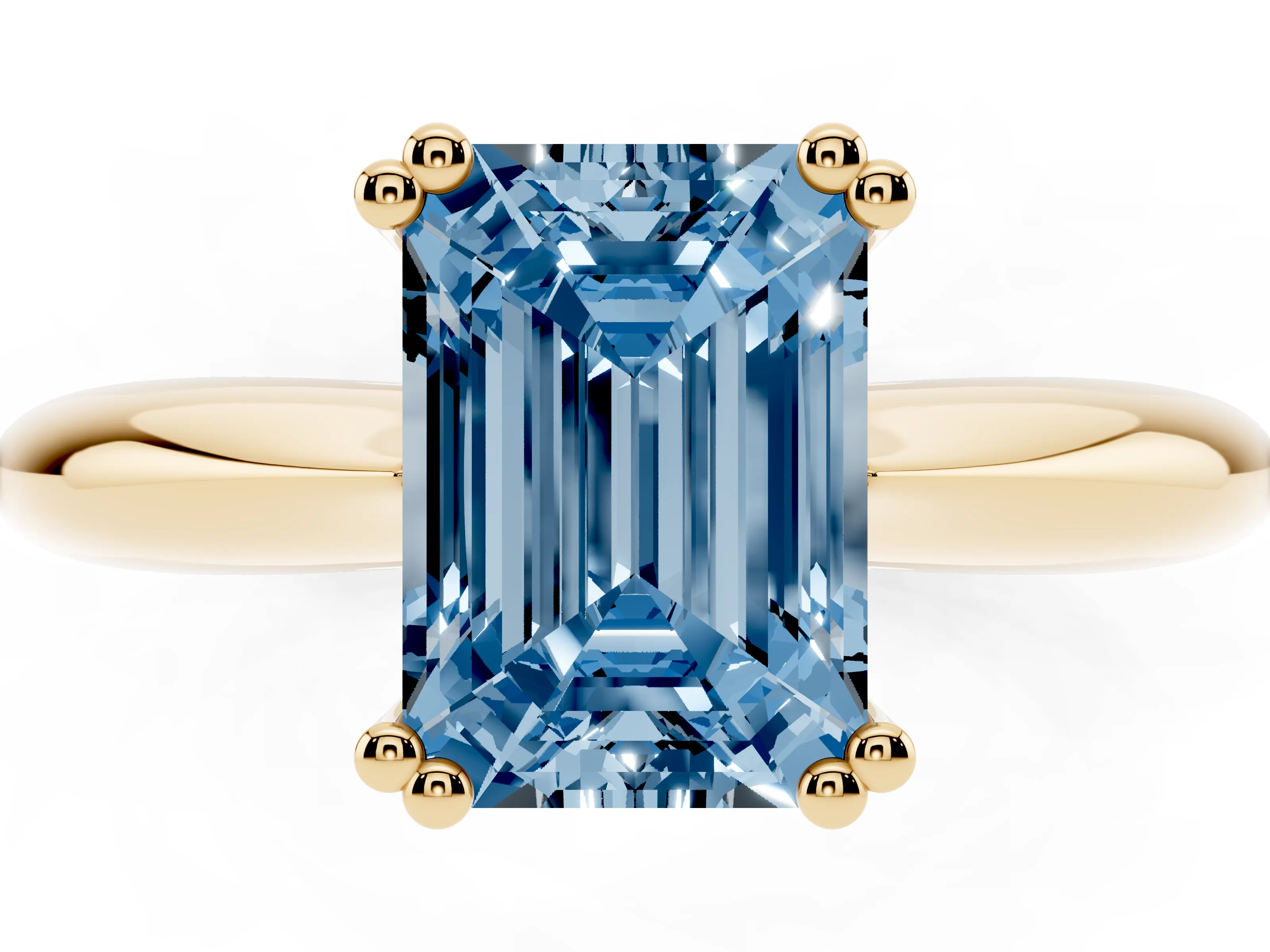 Fancy Blue Emerald Cut Diamond Solitaire Engagement Ring Set in Yellow gold with Tapered Band and Prong Setting