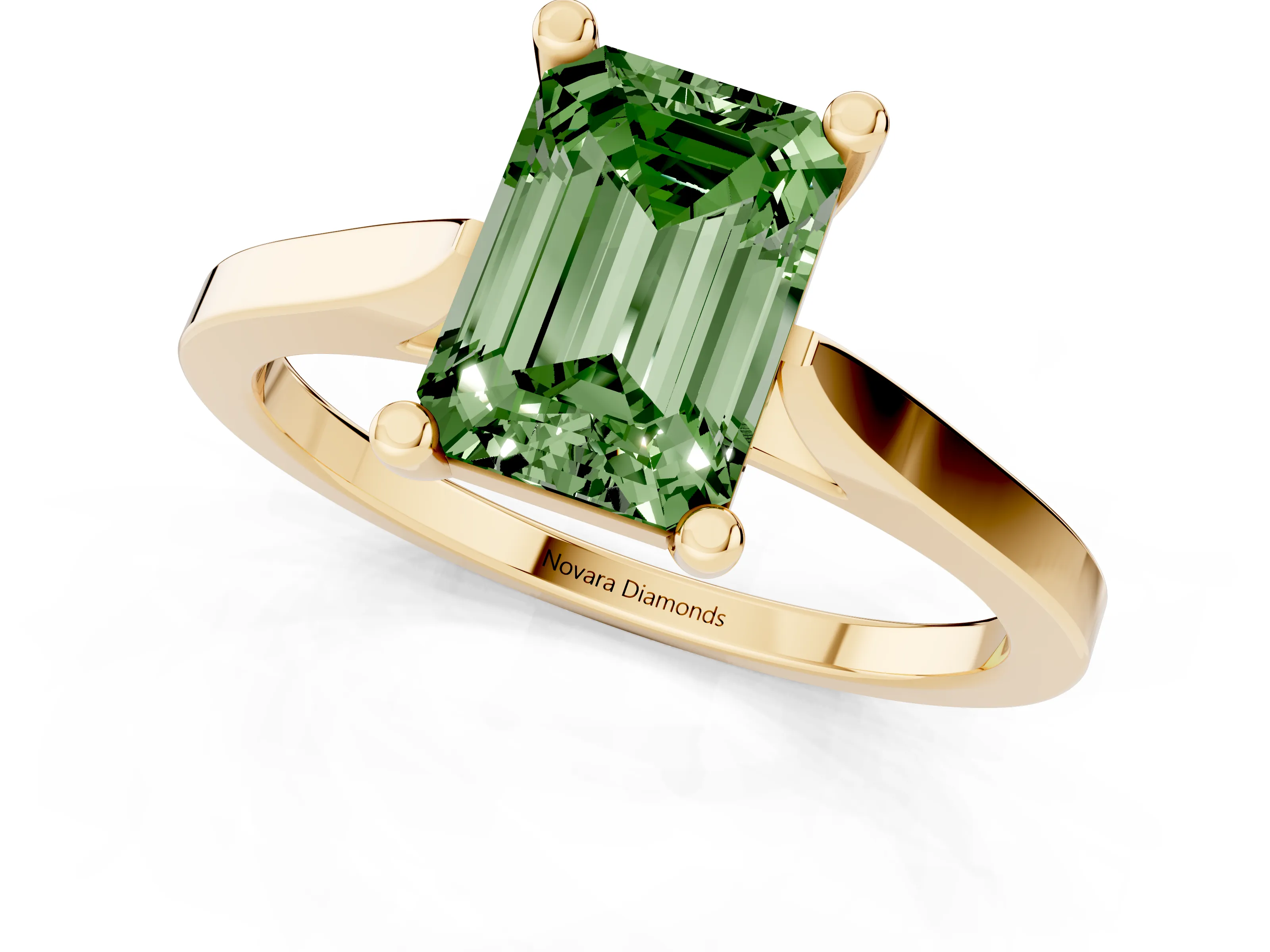 Fancy Green Emerald Cut Diamond Solitaire Ring Set in Yellow gold with Prong Setting and Tapered Band