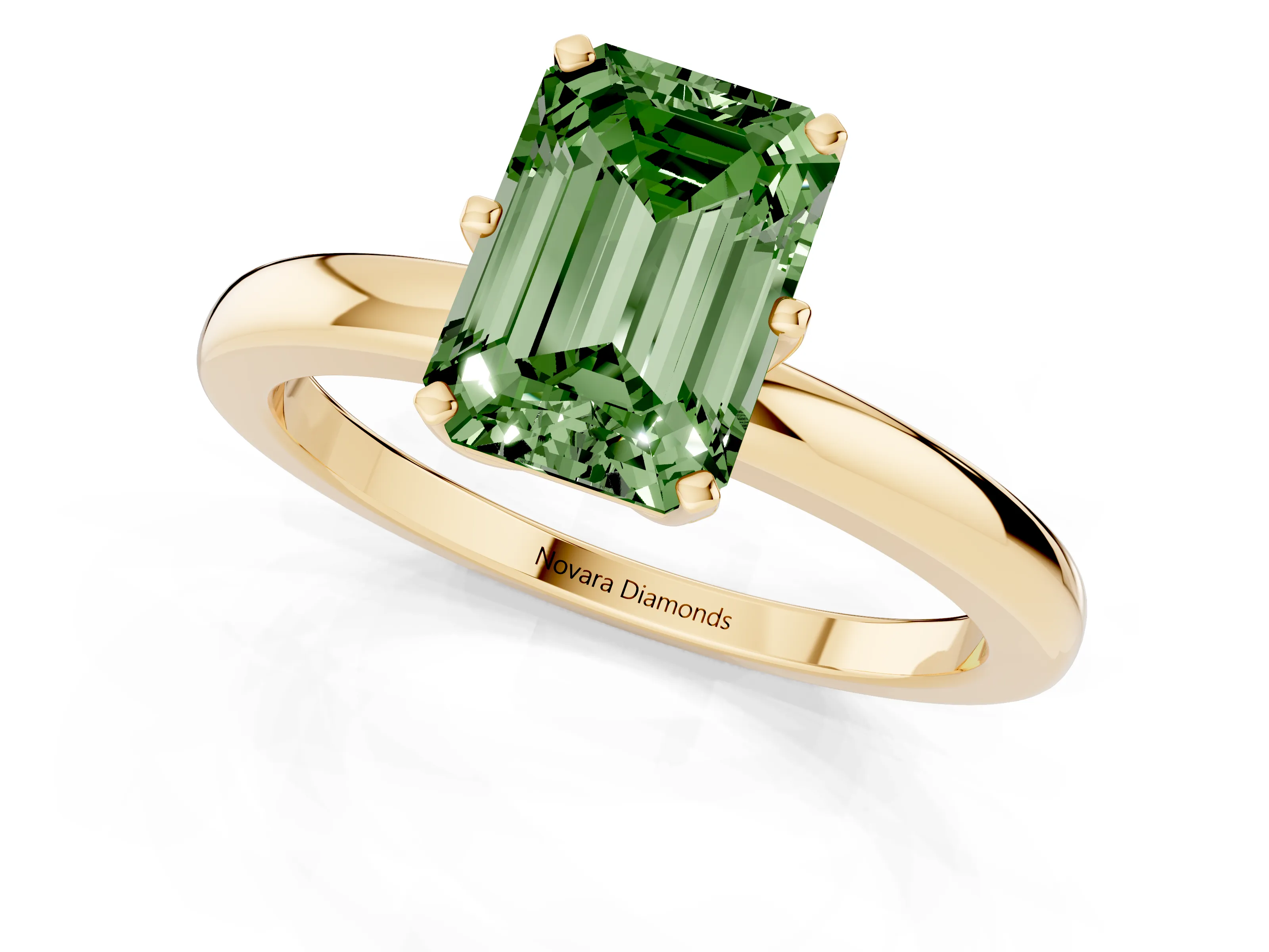 Fancy Green Emerald Cut Diamond Solitaire Ring Set in Yellow gold with Raised Prong Setting on a Classic Band
