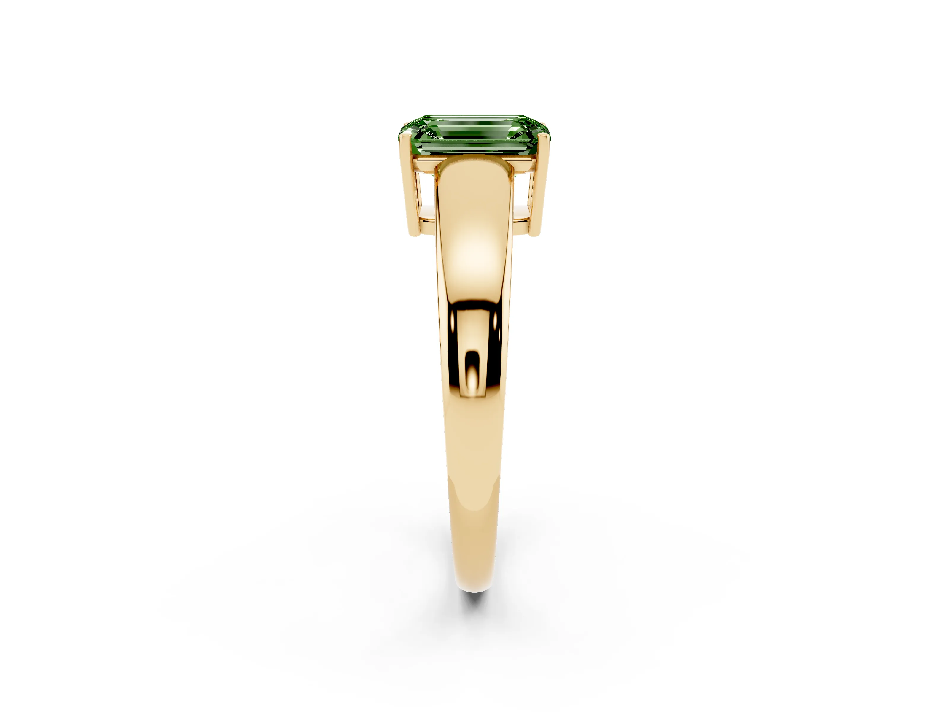 Fancy Green Emerald Cut Diamond Solitaire Ring Set in Yellow gold with Tapered Band and Prong Setting