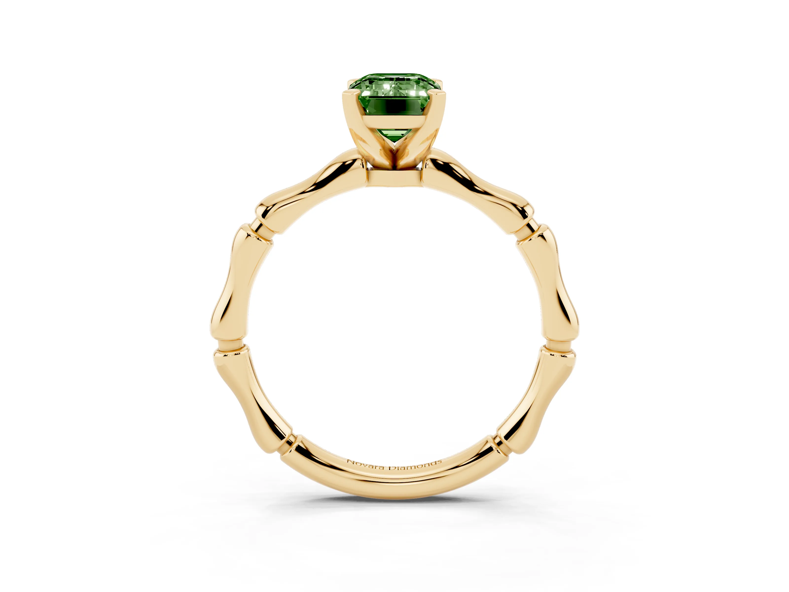 Fancy Green Emerald Cut Diamond Solitaire Ring Set in Yellow gold with Bamboo Band and Prong Setting
