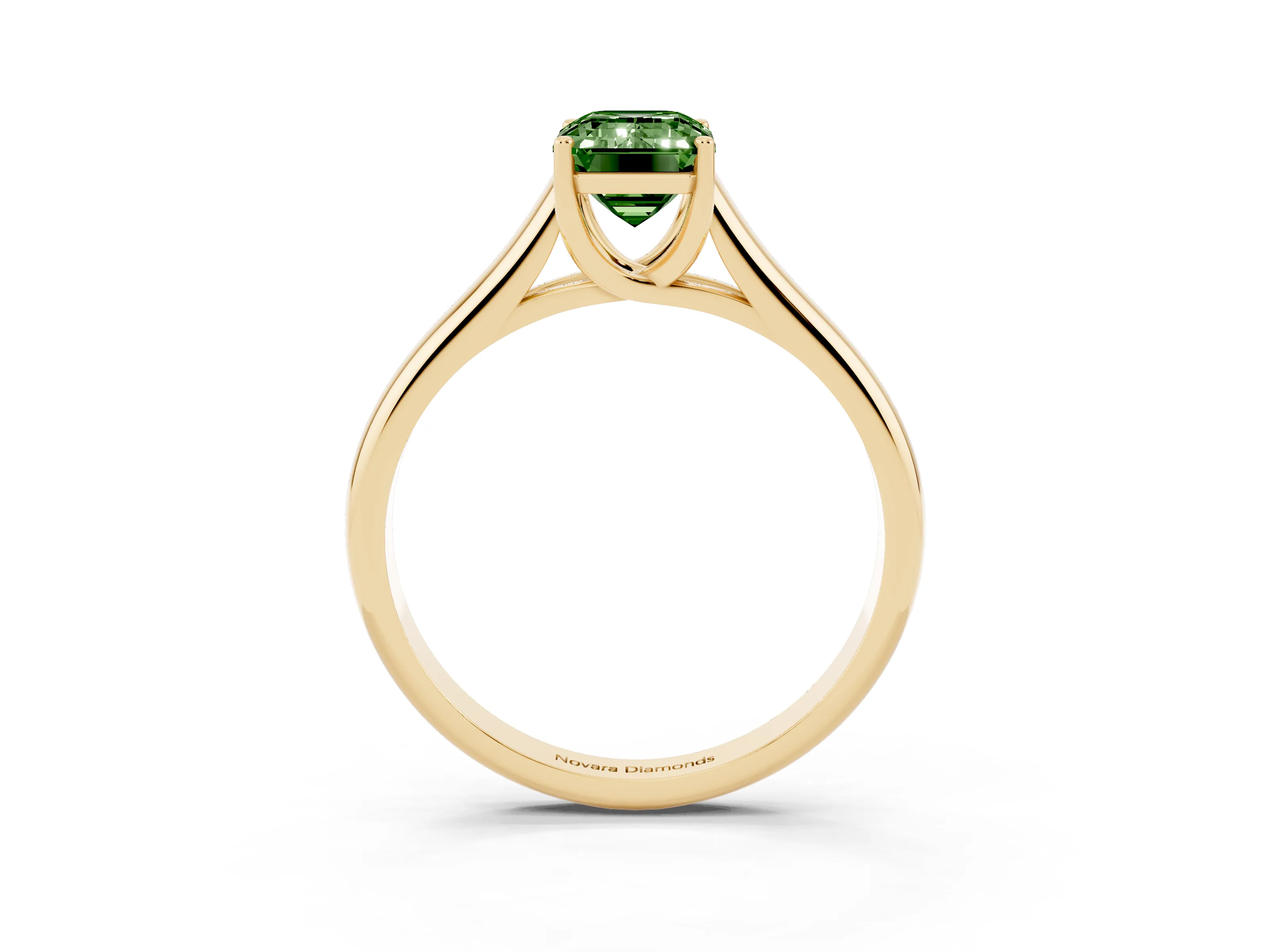 Fancy Green Emerald Cut Diamond Solitaire Engagement Ring Set in Yellow gold with Subtly Tapered Band and Prong Setting