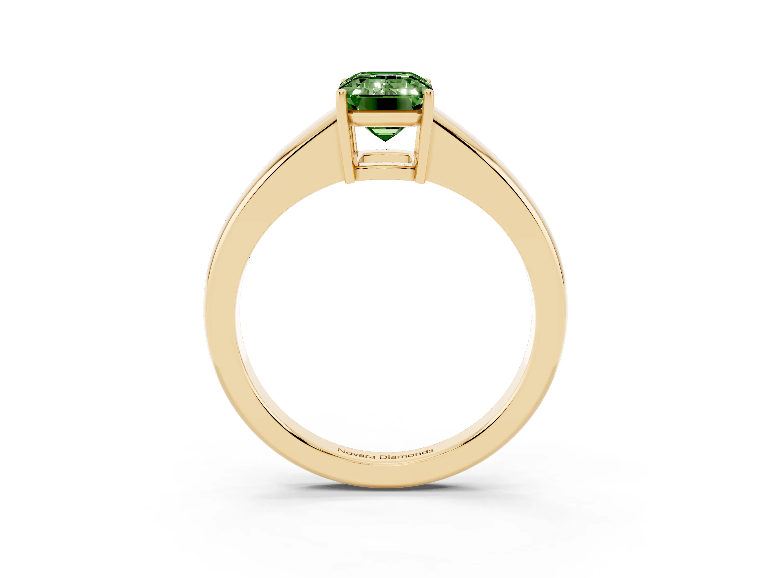 Fancy Green Emerald Cut Diamond Solitaire Ring Set in Yellow gold with Tapered Band and Prong Setting