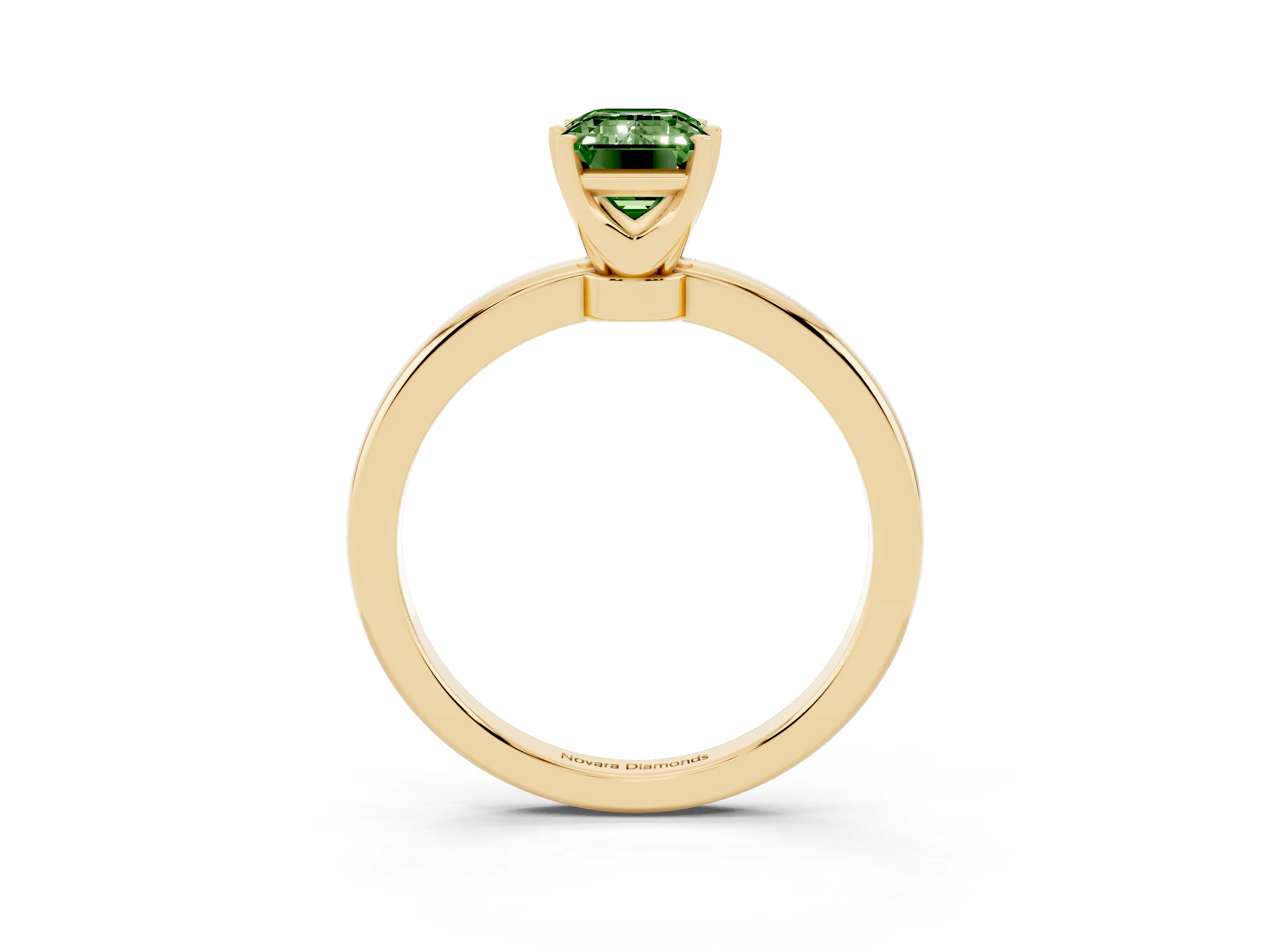 Fancy Green Emerald Cut Diamond Solitaire Ring Set in Yellow gold with Raised Prong Setting on a Classic Band