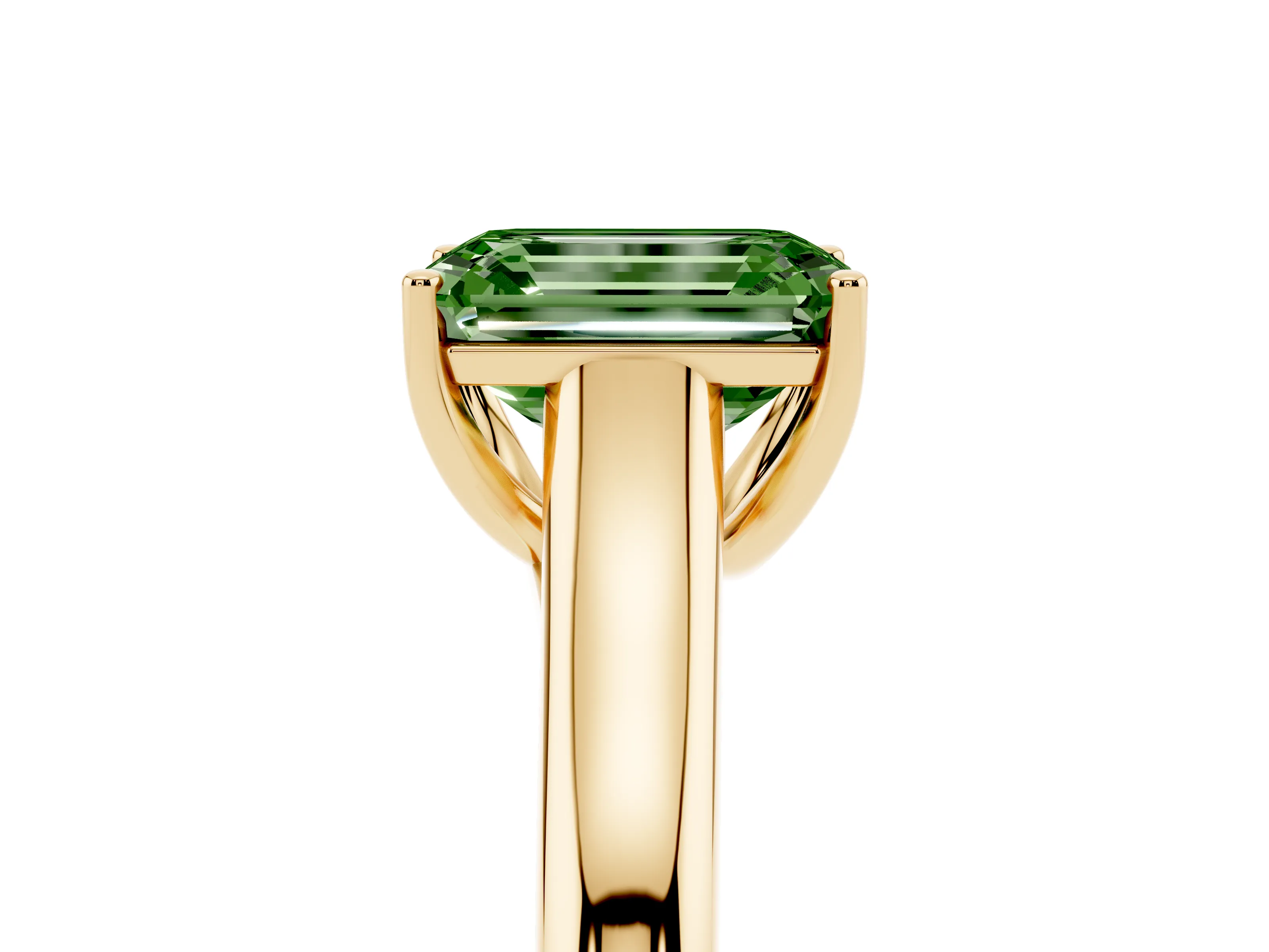 Fancy Green Emerald Cut Diamond Solitaire Engagement Ring Set in Yellow gold with Subtly Tapered Band and Prong Setting