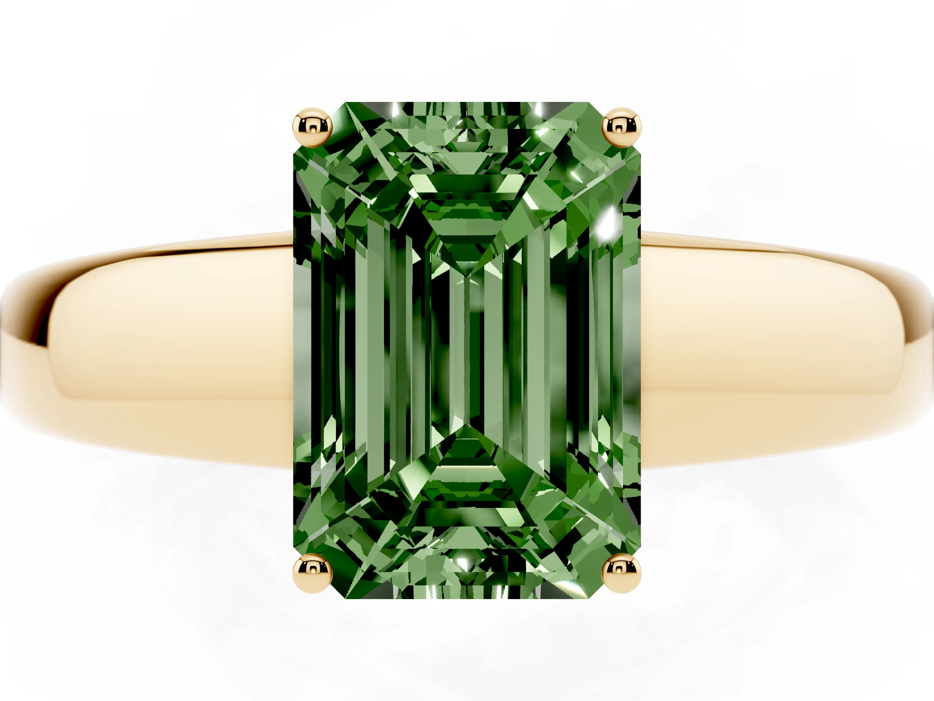 Fancy Green Emerald Cut Diamond Solitaire Ring Set in Yellow gold with Tapered Band and Prong Setting