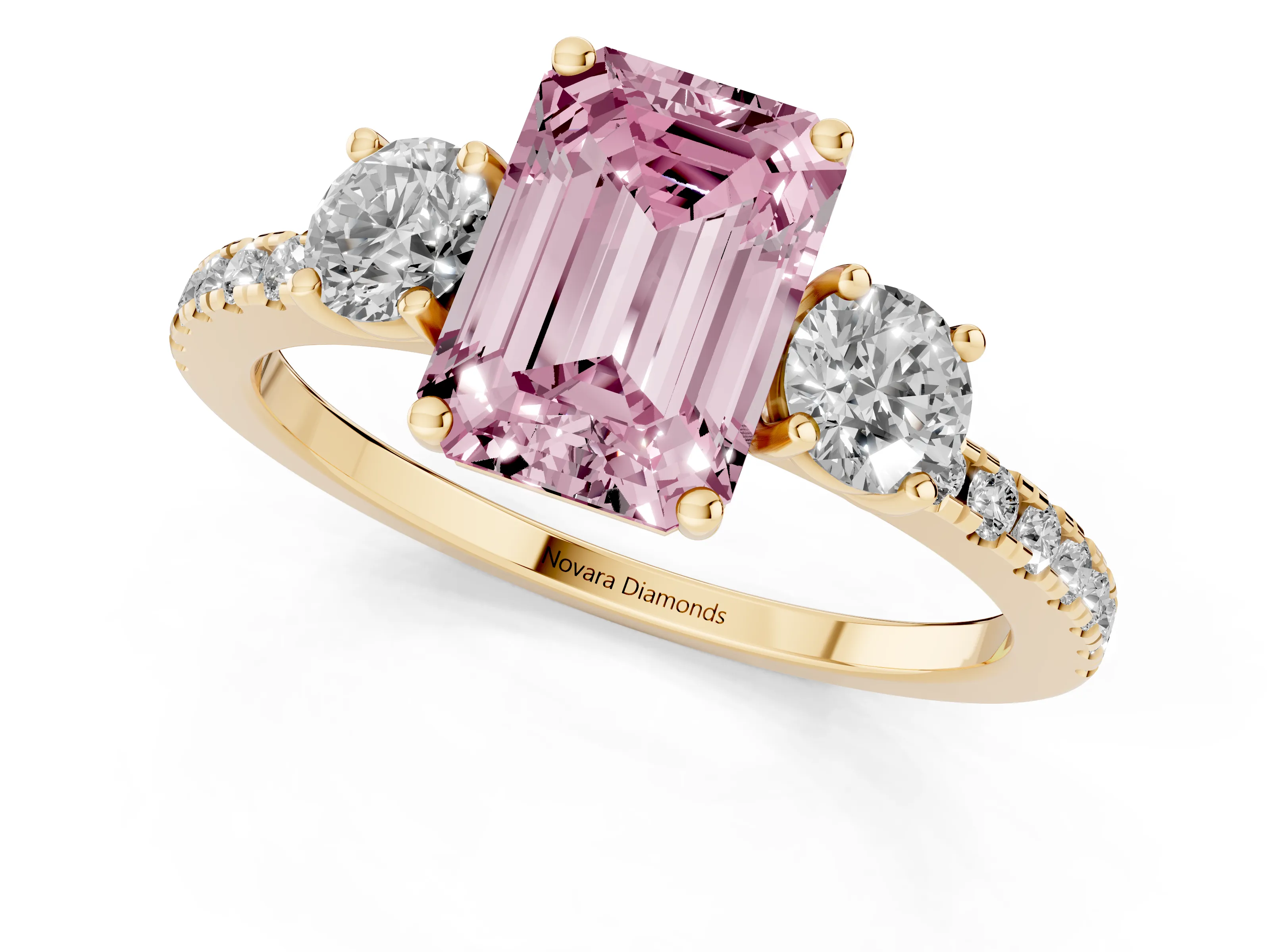 Fancy Pink Emerald Cut Diamond Three-Stone Ring Set in Yellow gold with Pavé Band and Graduated Sides