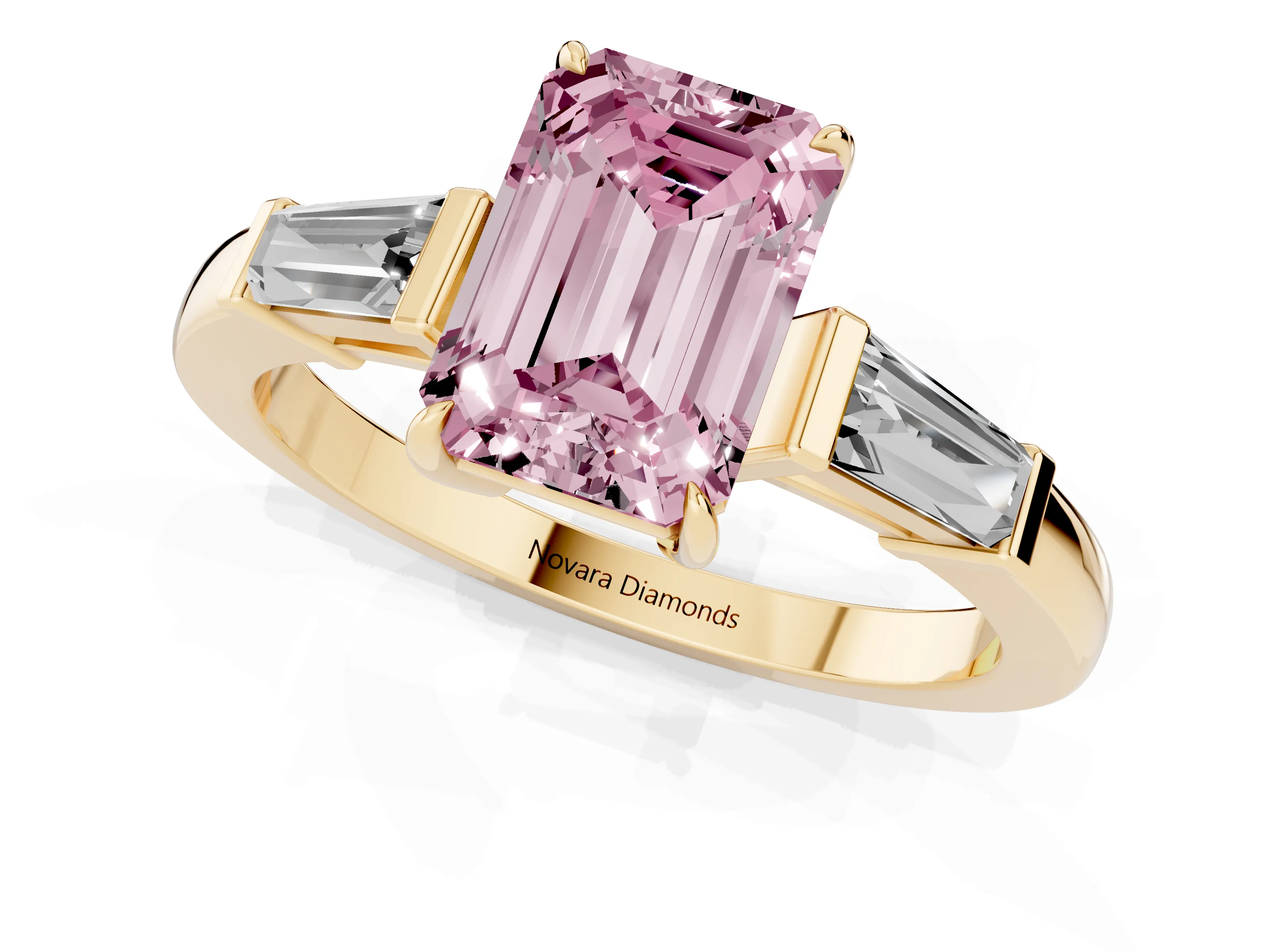 Fancy Pink Emerald Cut Diamond Three-Stone Ring Set in Yellow gold with Tapered Baguette Side Stones and Prong Setting