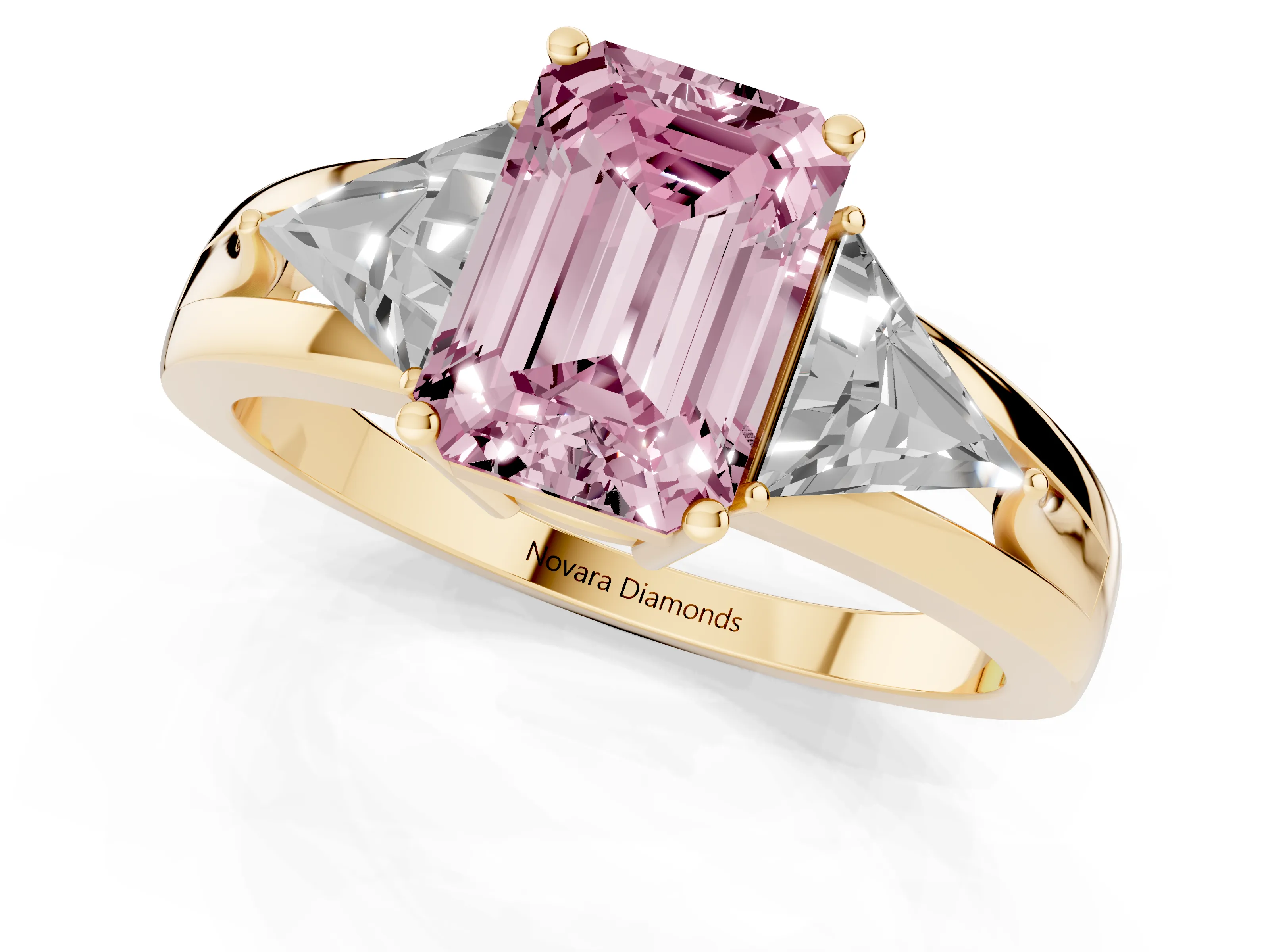 Fancy Pink Emerald Cut Diamond Three-Stone Ring Set in Yellow gold with Trillion Side Stones and Split Shank