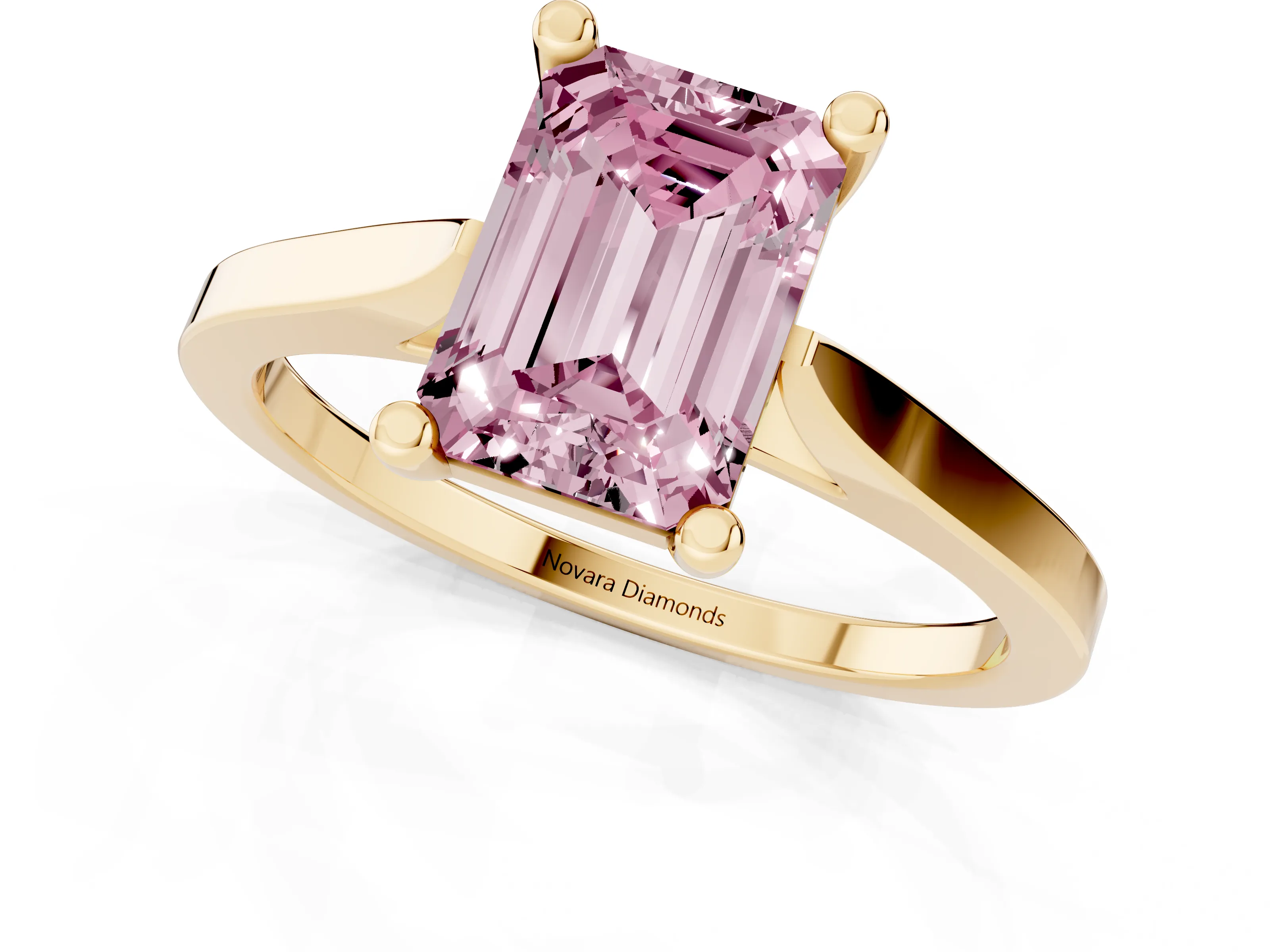 Fancy Pink Emerald Cut Diamond Solitaire Ring Set in Yellow gold with Prong Setting and Tapered Band