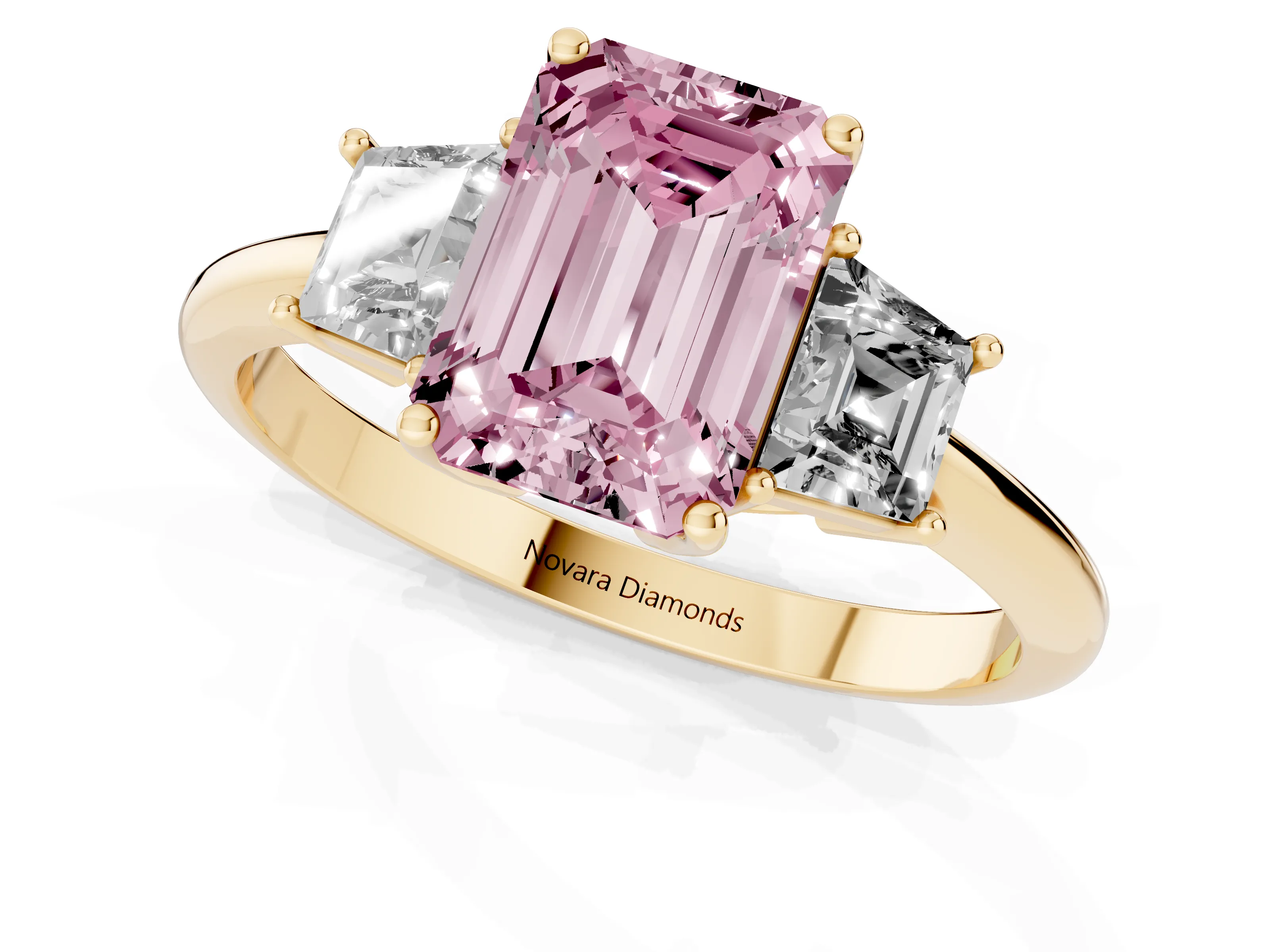Fancy Pink Emerald Cut Diamond Three-Stone Ring Set in Yellow gold with Trapezoid Side Stones and Prong Setting